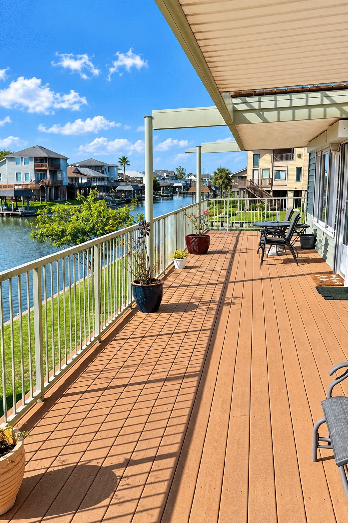 Enjoy sunsets and water views from this expansive deck.