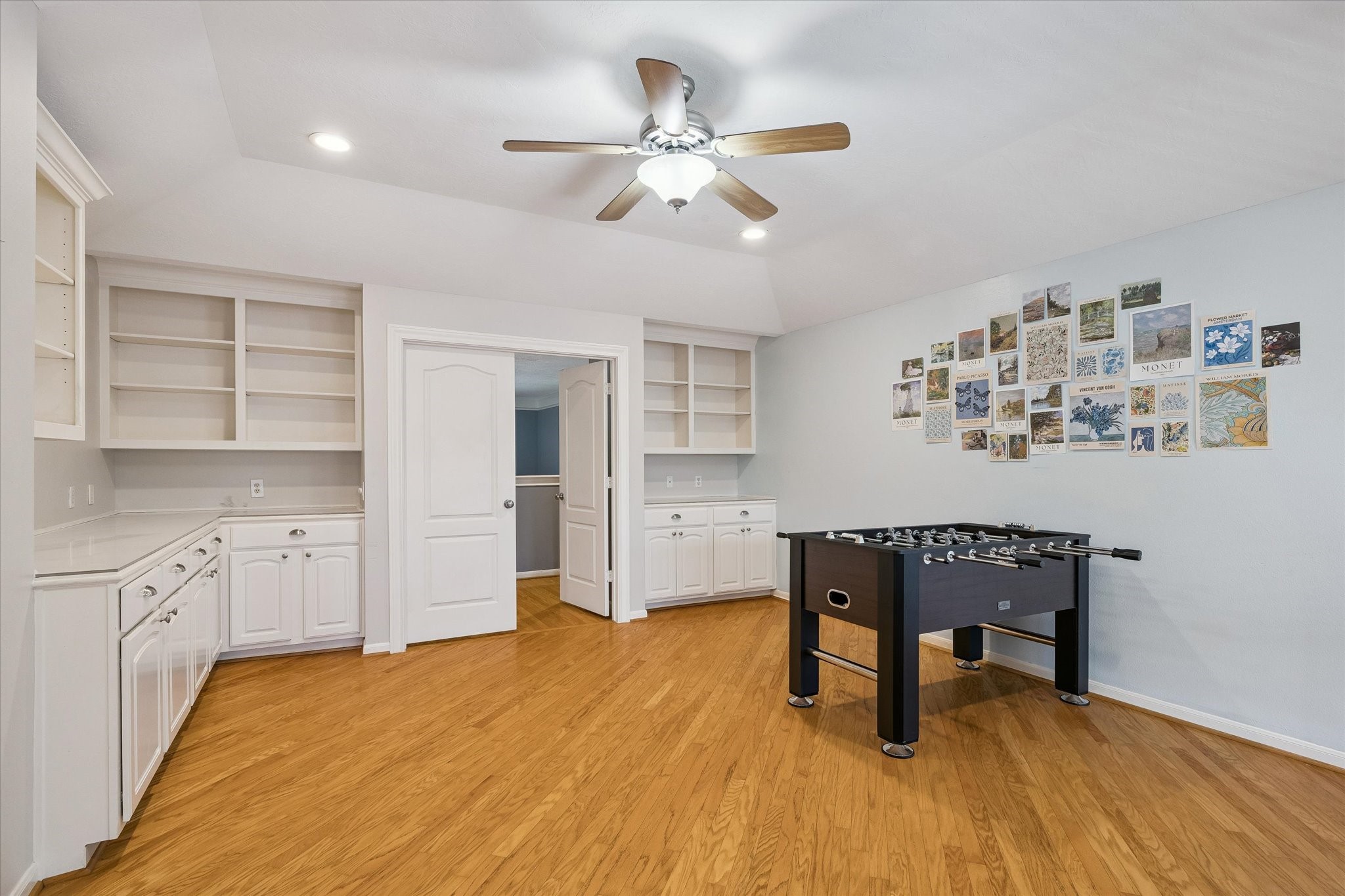 Game room with built in craft tables and storage
