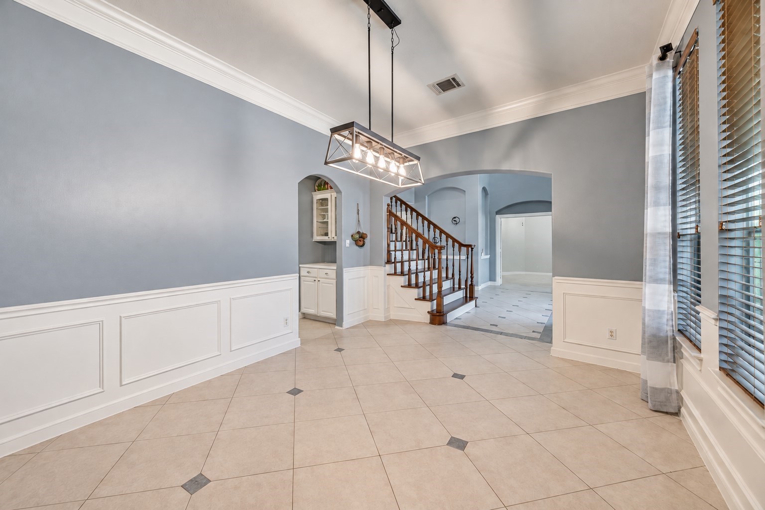Formal dining room with elegant millwork