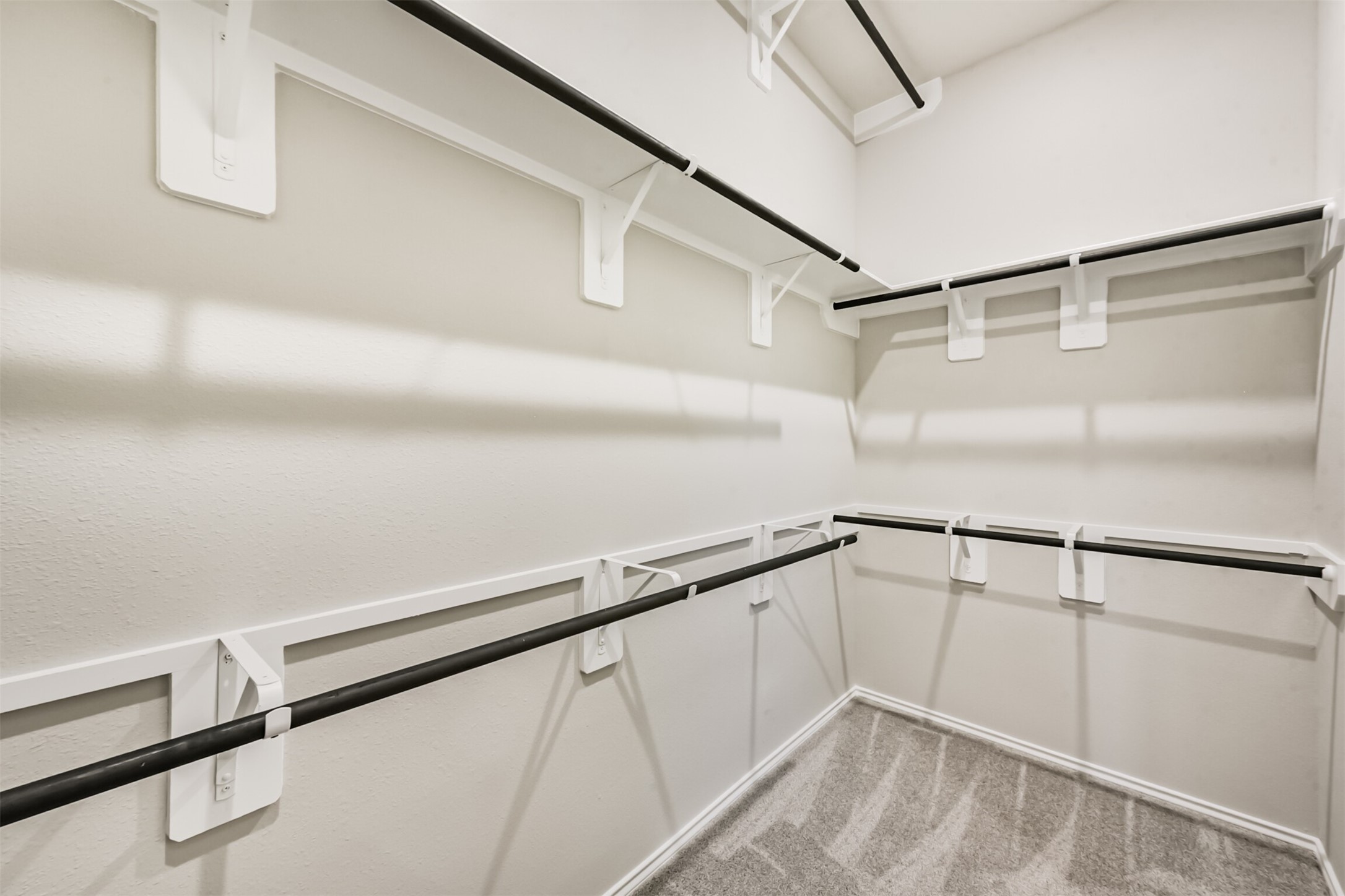 MASTER BEDROOM WALK IN CLOSET