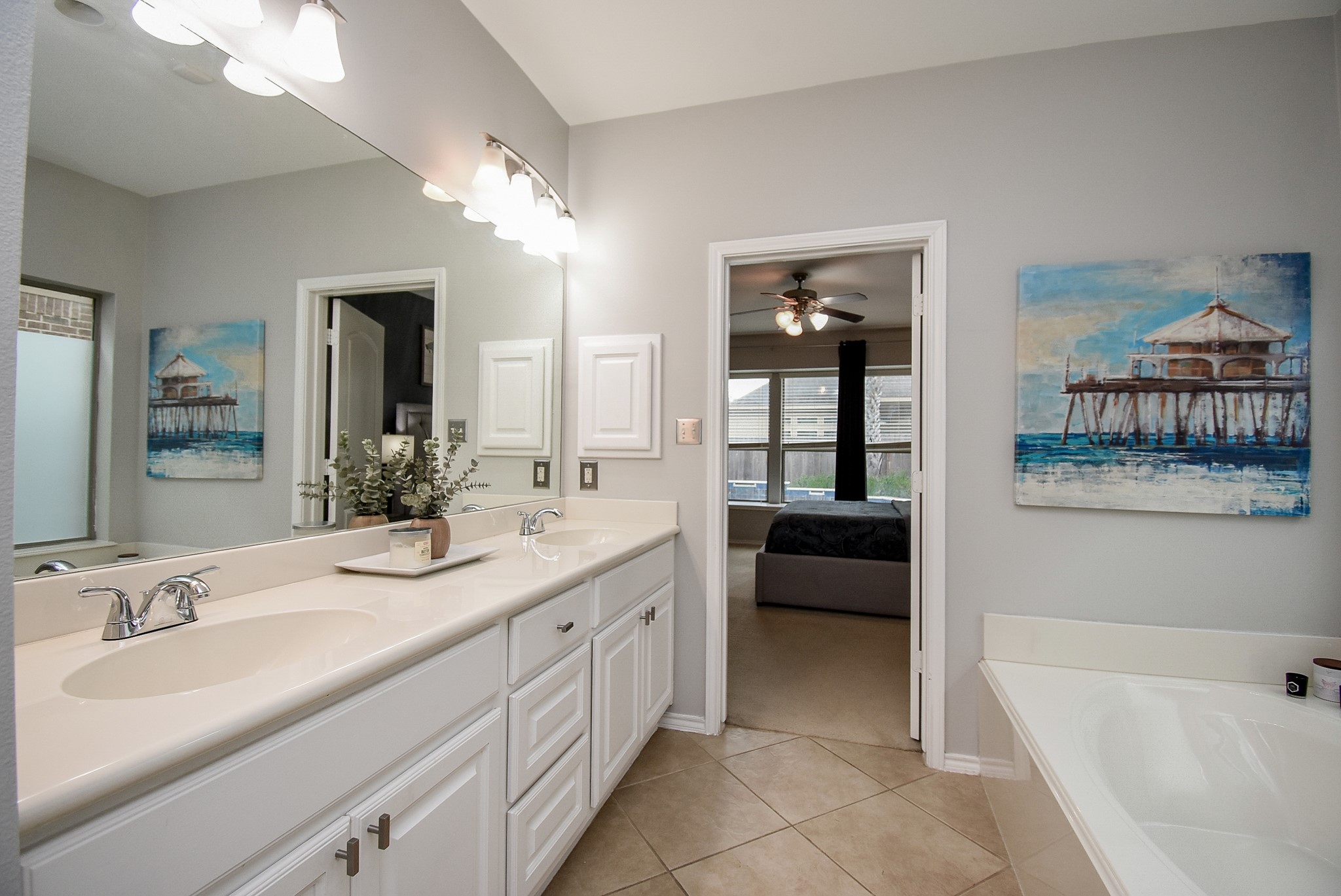 Thewalk-in closet features built-in shelves and extra storage space!