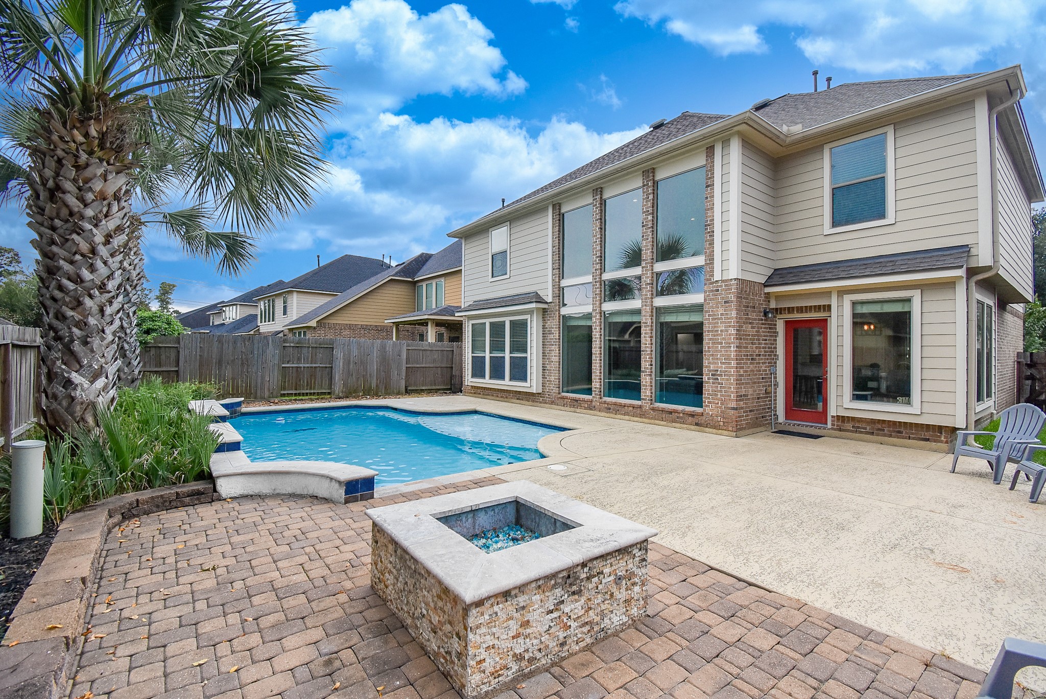 Wise Investment checks all the boxes! New ROOF, Fresh Paint, Fire Pit, and so much more! A custom made gas  firepit turns the backyard into a haven in the winter. This backyard is well suited for all seasons!