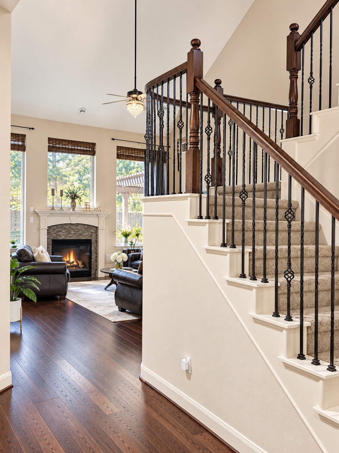 Open upstairs landing overlooks the living areas and highlights the home's impressive ceiling height.