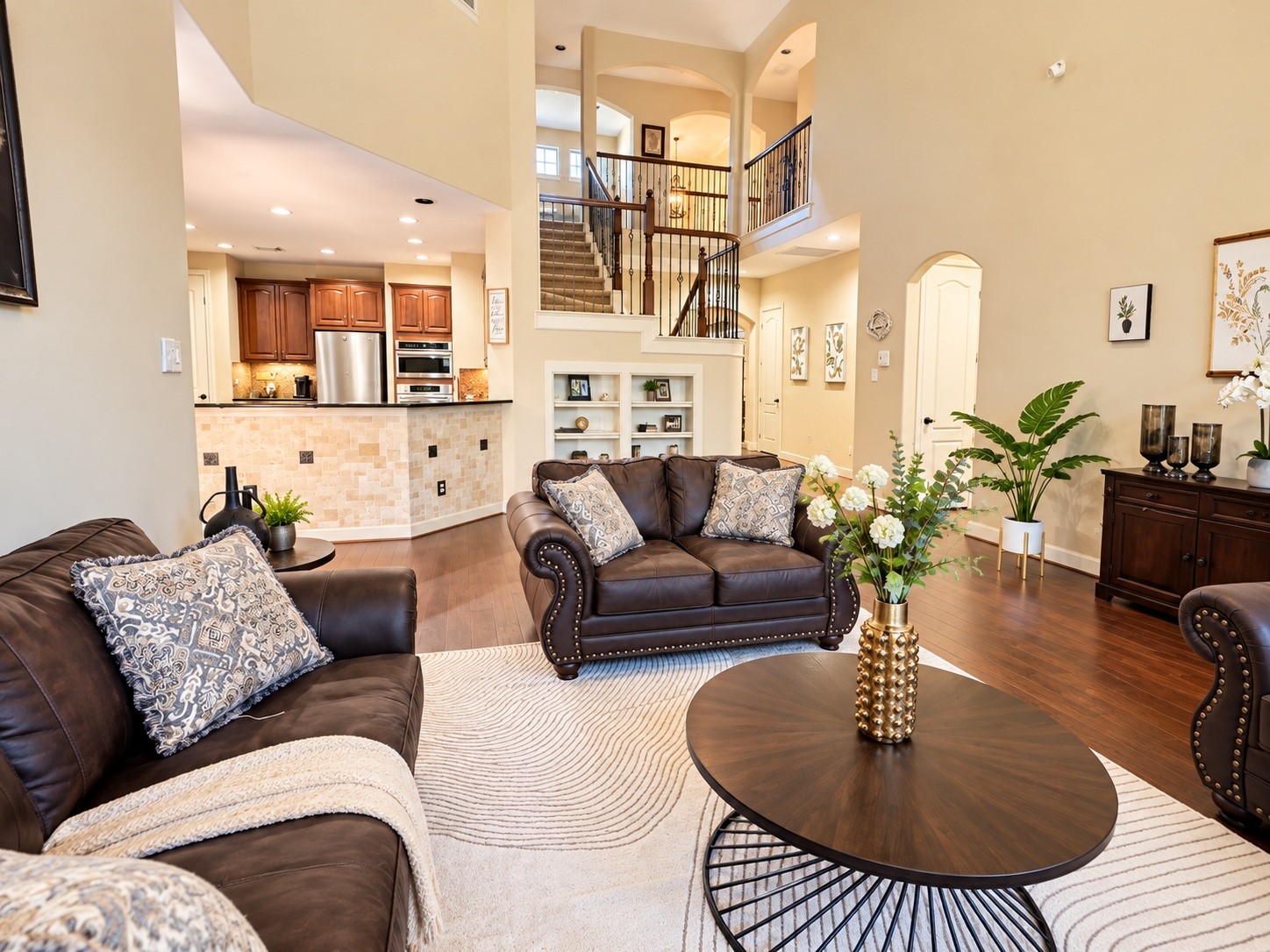 Bright and spacious family room flows effortlessly into the kitchen and breakfast area, creating the perfect space for togetherness.