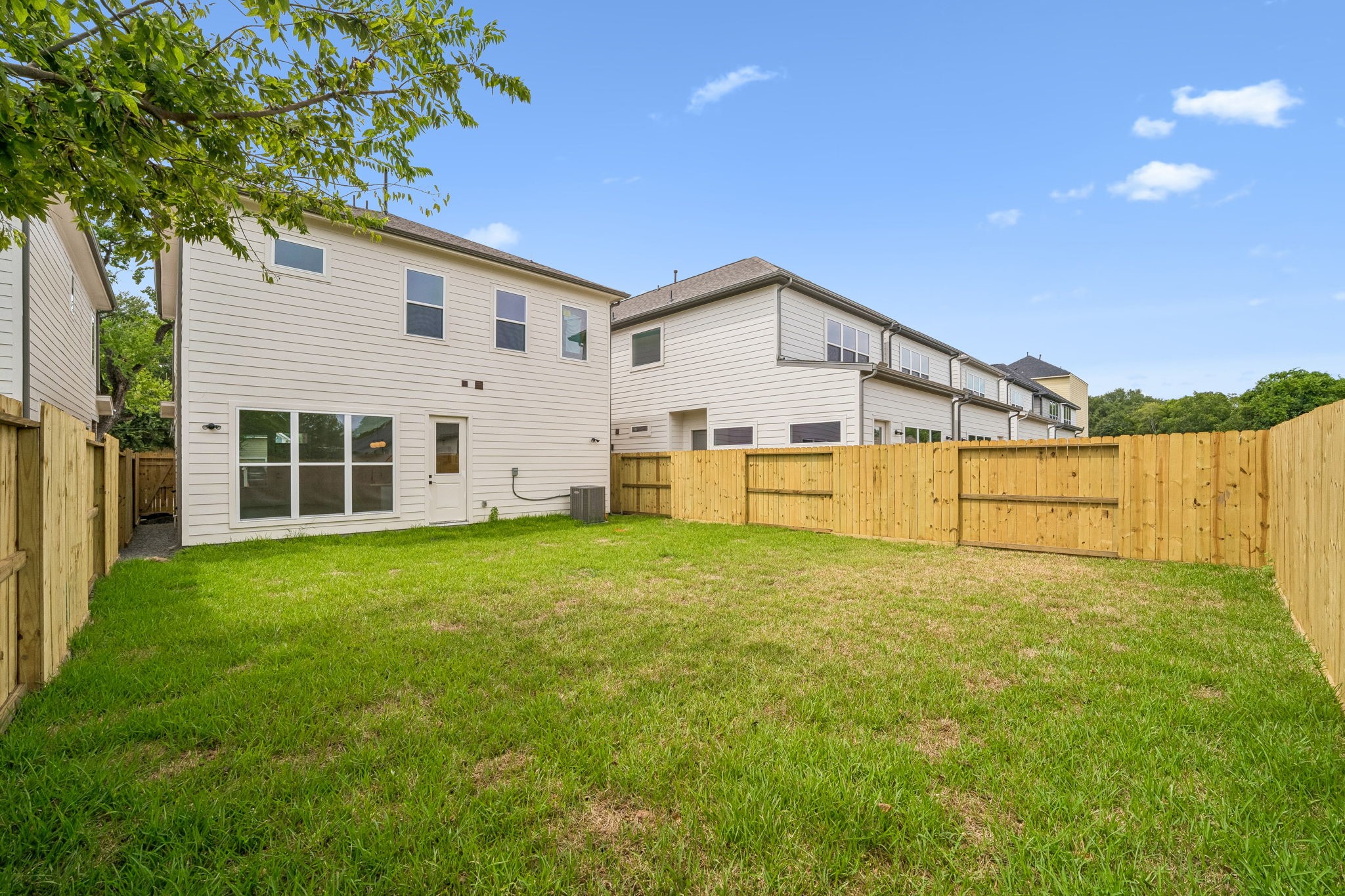 Not commonly seen for new construction, these units have an expansive back yard & fully fenced. Not commonly seen for new construction, these units have an expansive back yard & fully fenced.