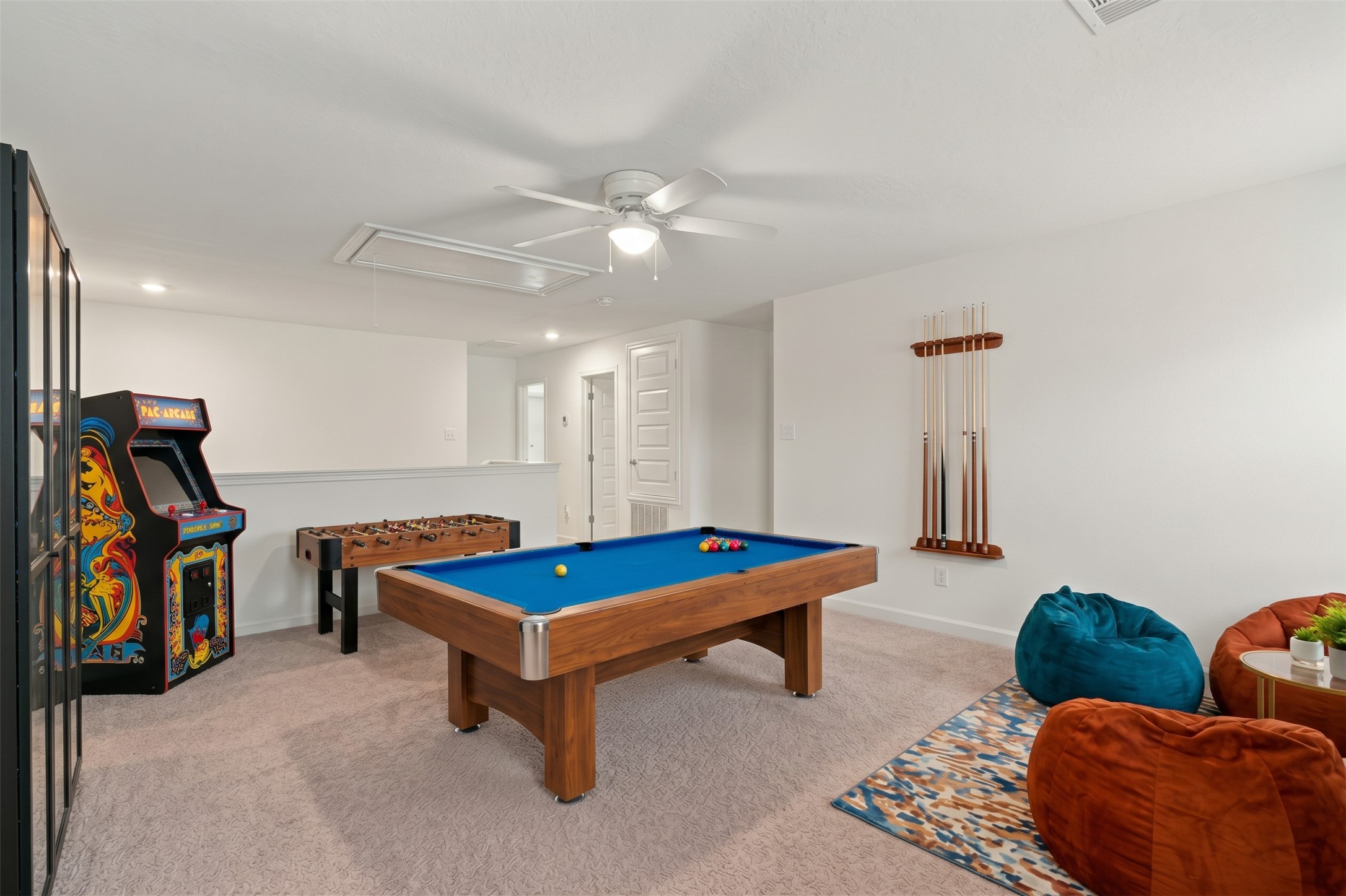 Virtually Staged: With its generous dimensions and versatile design, this space is ideal for creating a game room, playroom, or comfortable secondary living area.