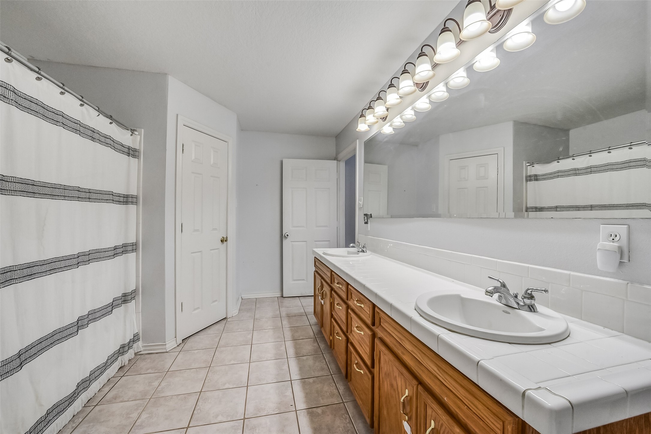 Tile flooring in bathroom.