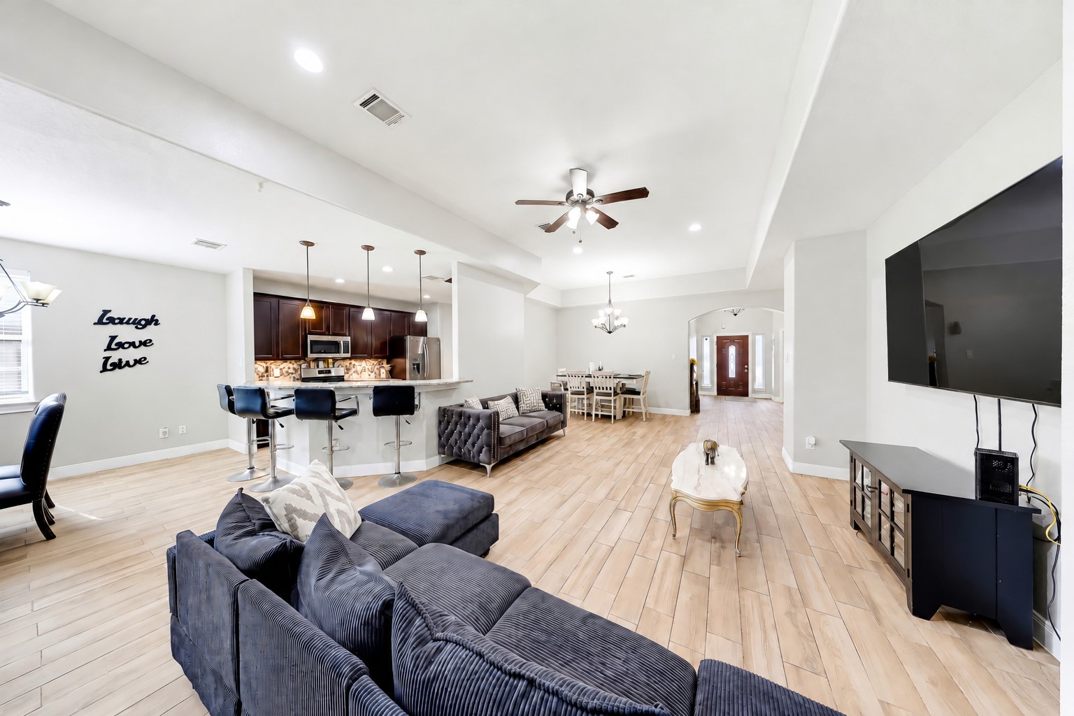 Stay connected with an open layout that brings cooking, conversation, and relaxation together.
