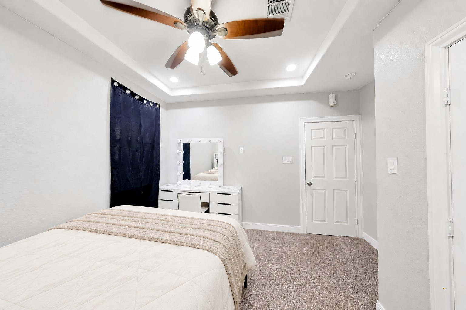 Add a desk or reading nook to make the most of this generously sized bedroom.