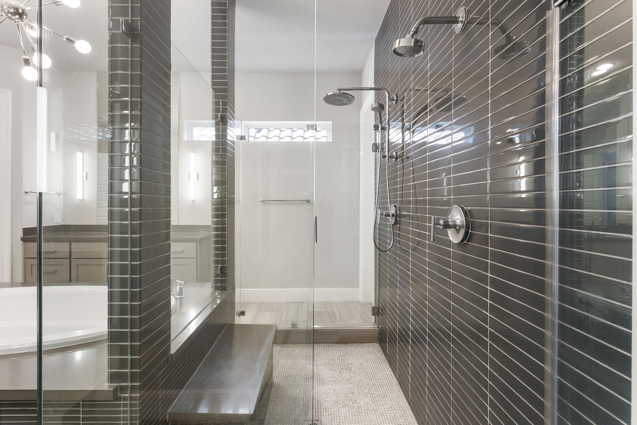 Dual shower heads in the oversized showr.