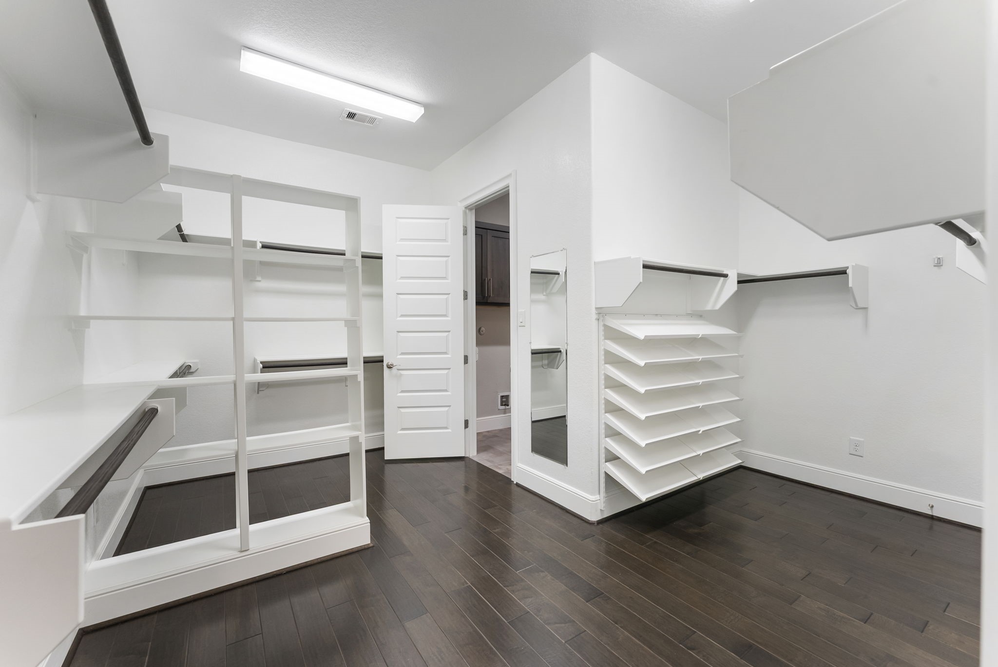 Expansive primary closet.