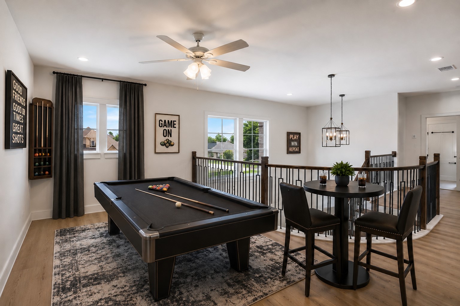 Virtually stage gameroom. Curtains are virtually staged to help see all the possibilities.