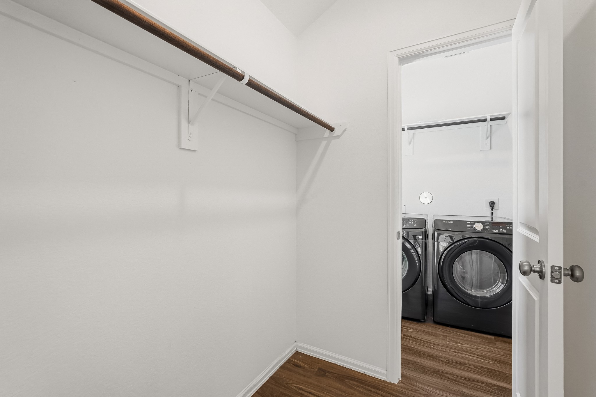 Primary closet leads to access of the laundry room.