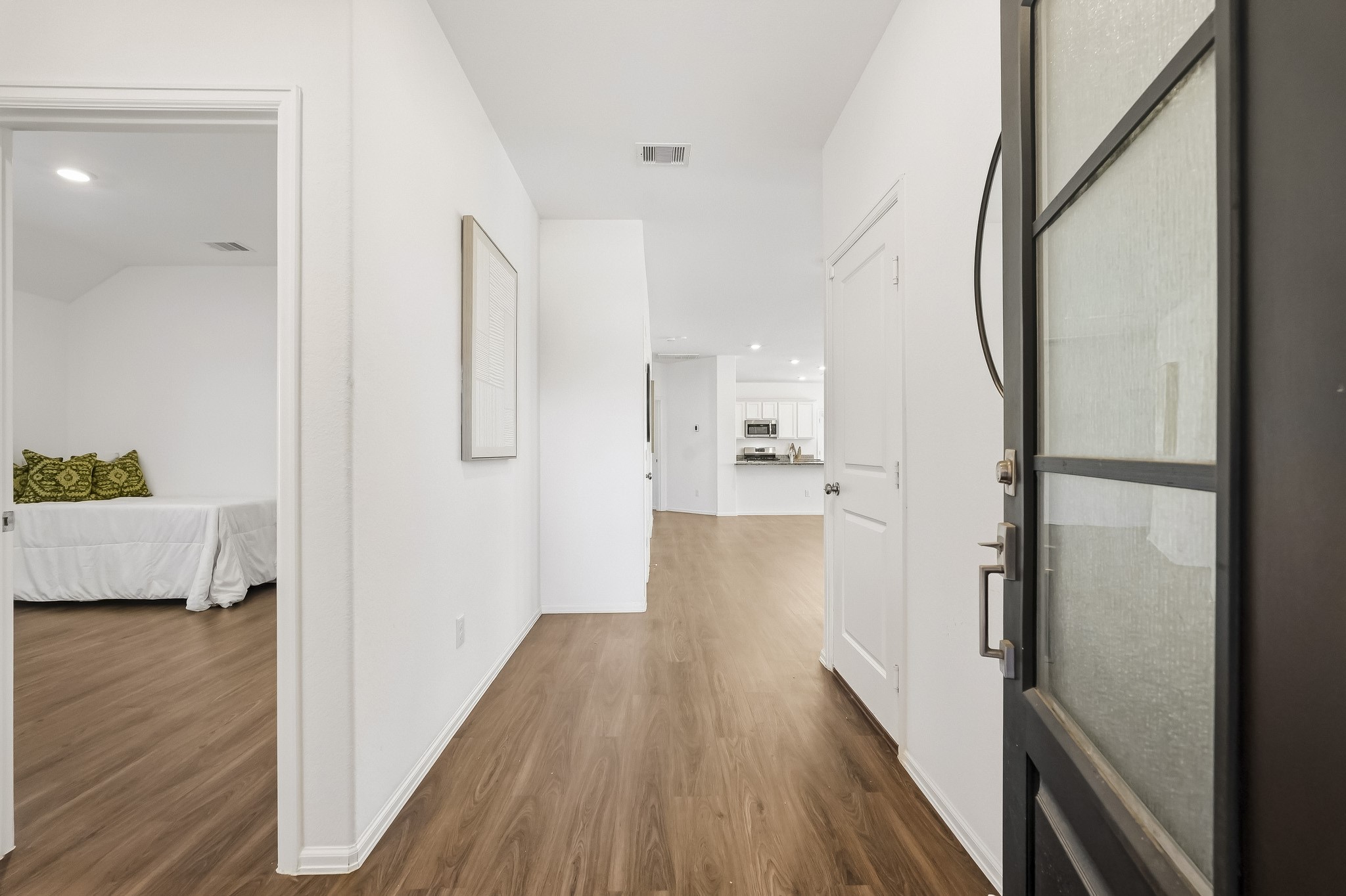 As you enter you are welcomed into the entry with solid floors throughout the home and so much light!