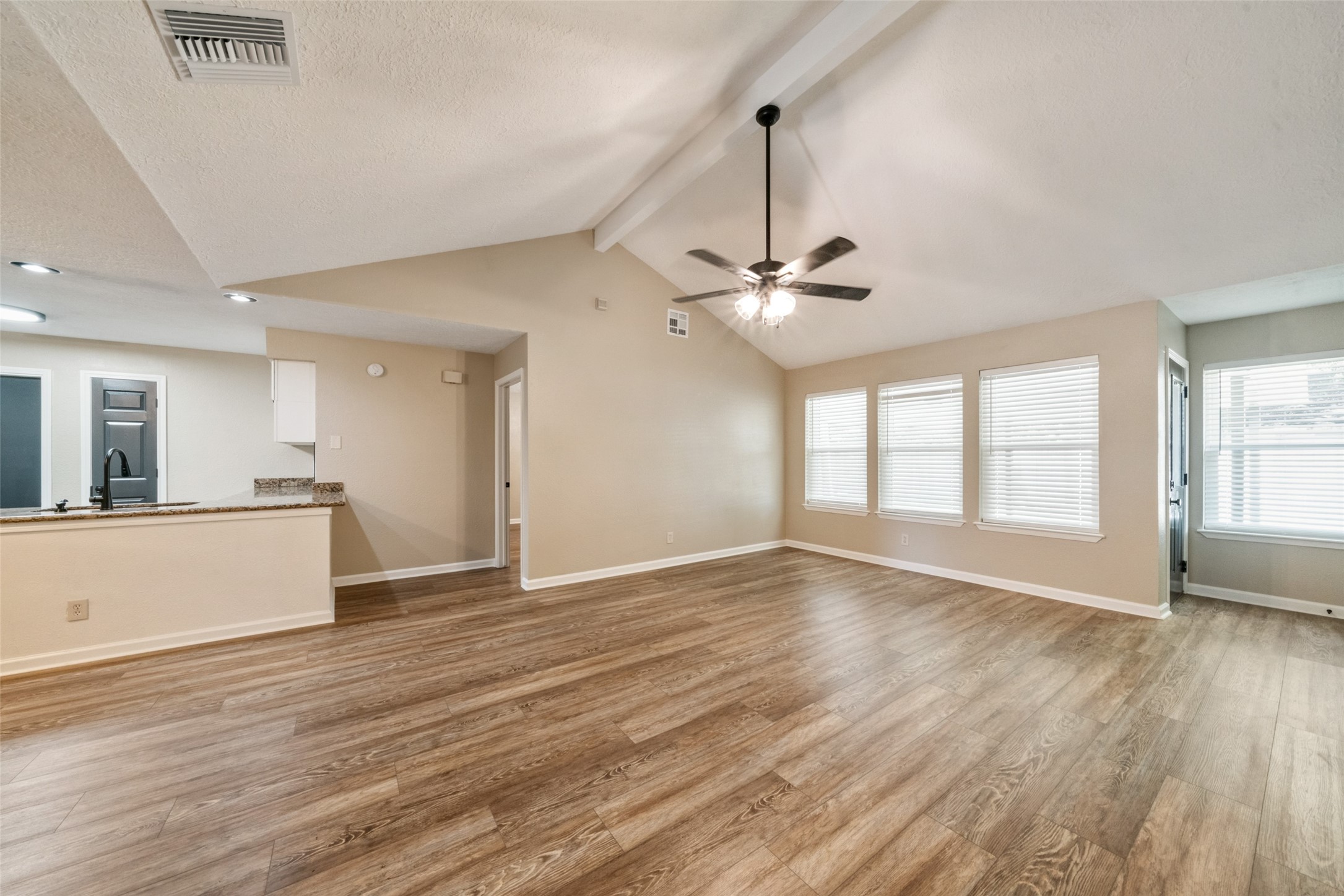 Living room and kitchen viewed from the front door