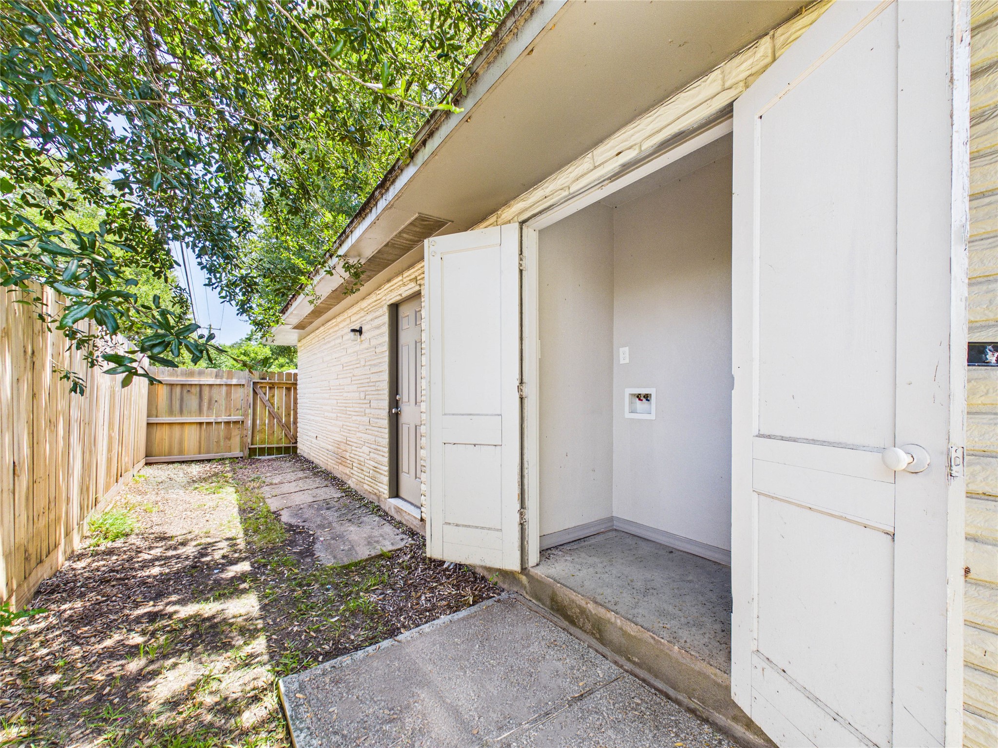 Side yard and laundry room
