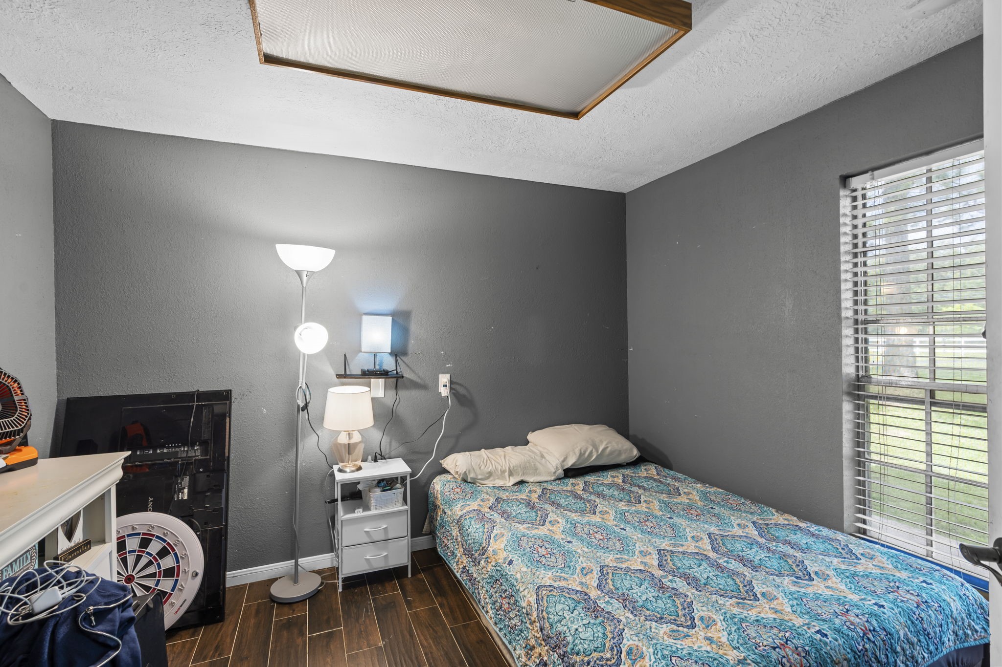 Downstairs bedroom but could also be office/flex room. Has 1/2 bathroom right before entrance.