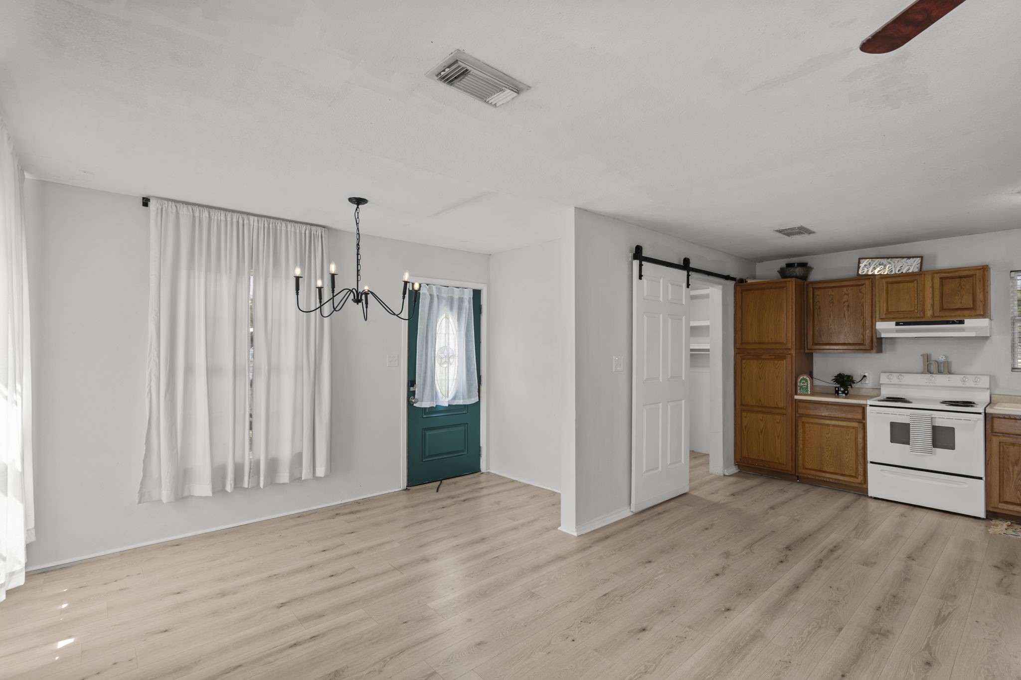 Guest house has 1 bedroom/bathroom, separate electric meter and driveway. Doors are pocket/barn doors.