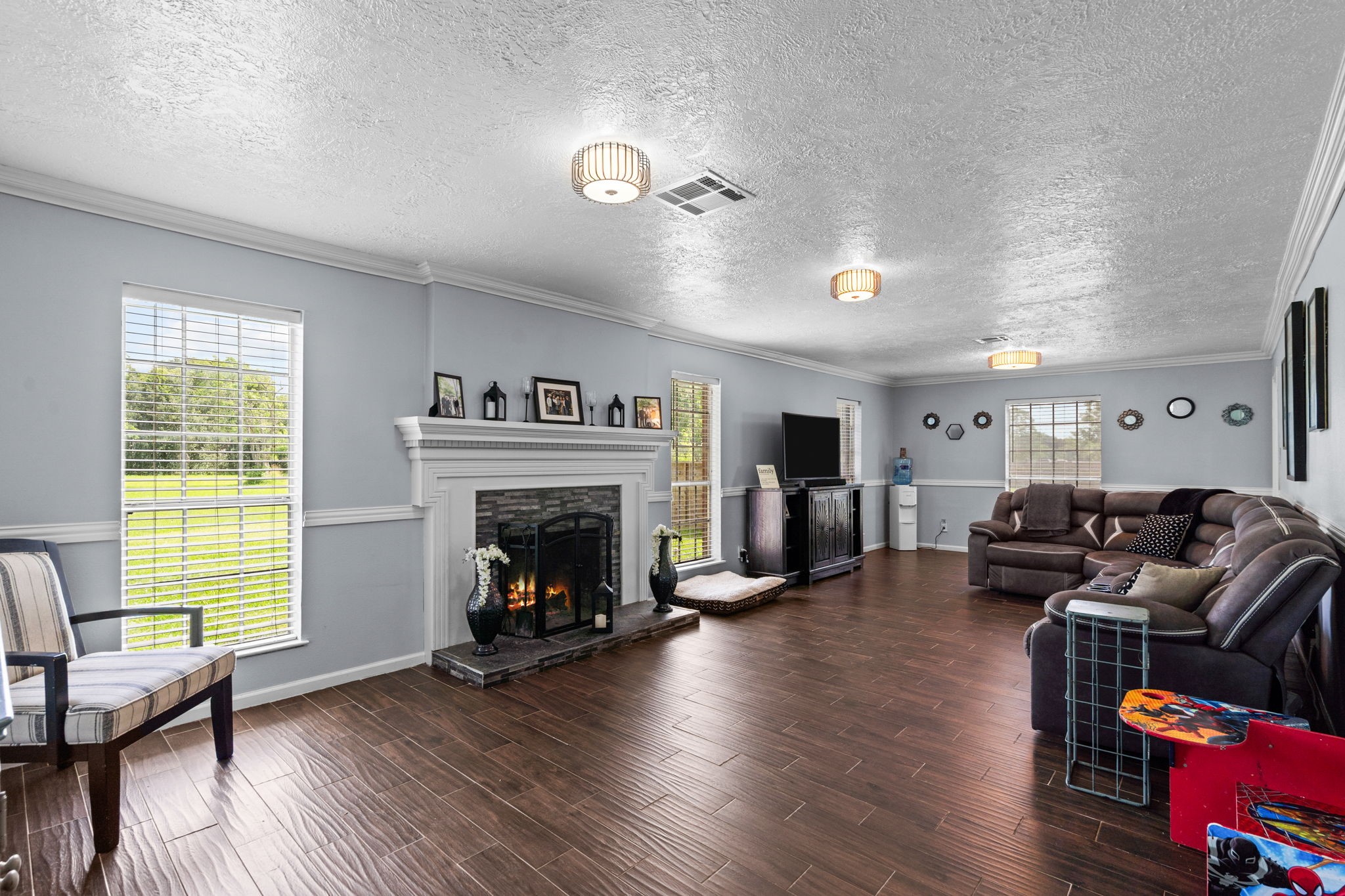 Living room that looks out into the front yard. Living room that looks out into the front yard.