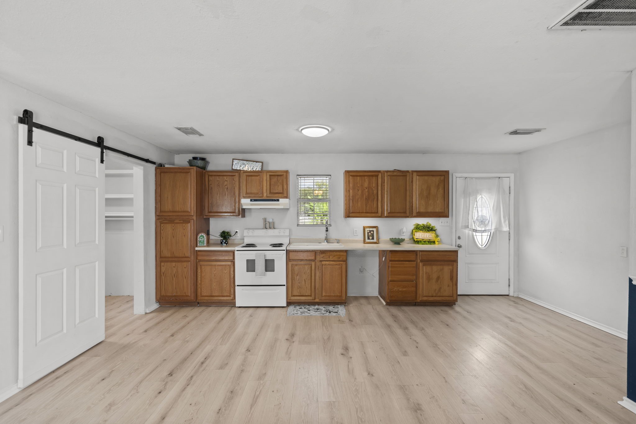 Kitchen and storage area to guest house.