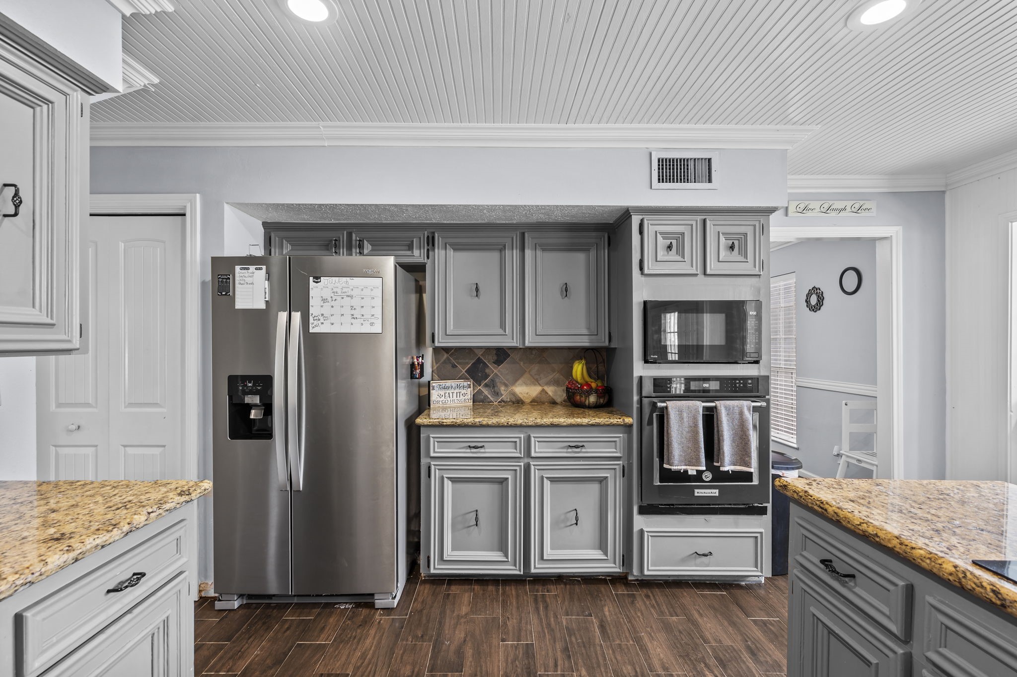 Stainless steel appliances in this chef's kitchen.