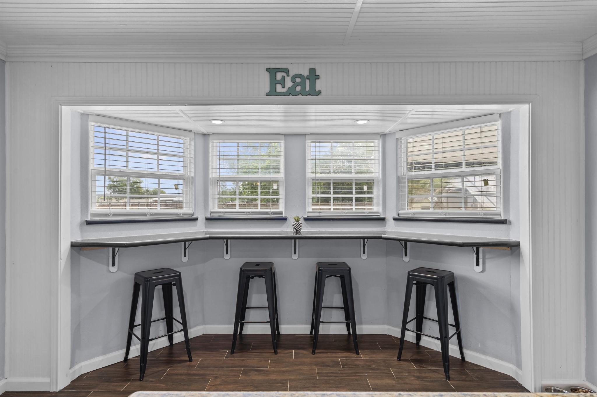 Breakfast bar that looks out onto the pool area.