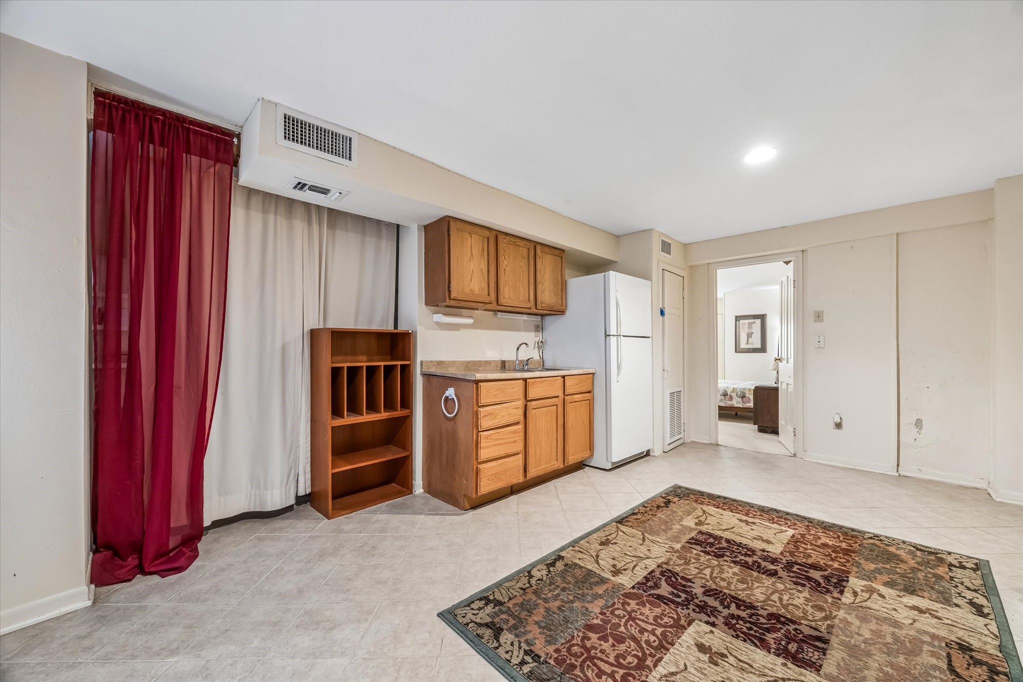 This is a large extra room which is part of the first floor guest room.