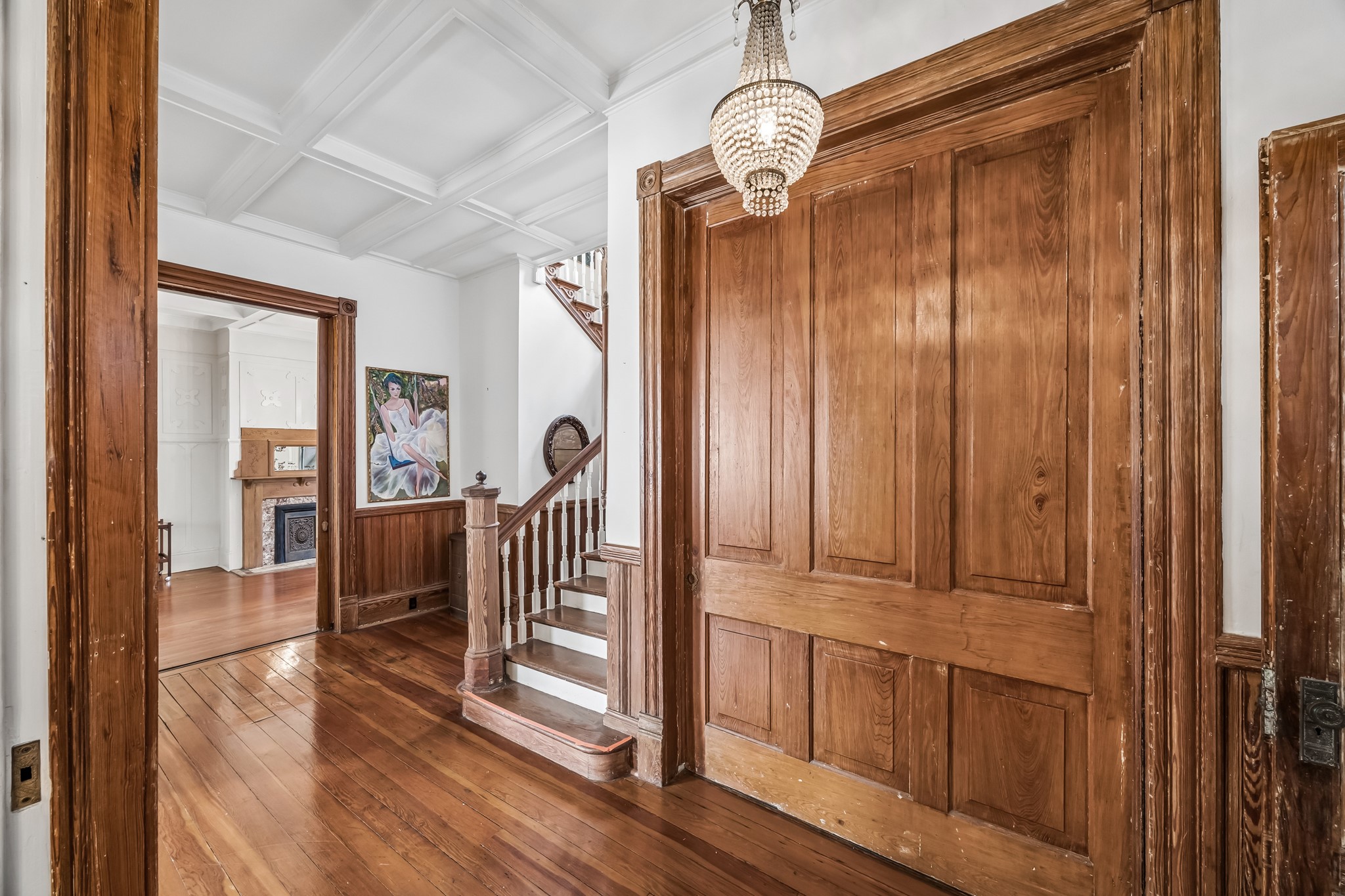 Take another look at this amazing pocket door, the tray ceiling and the stunning woodwork!