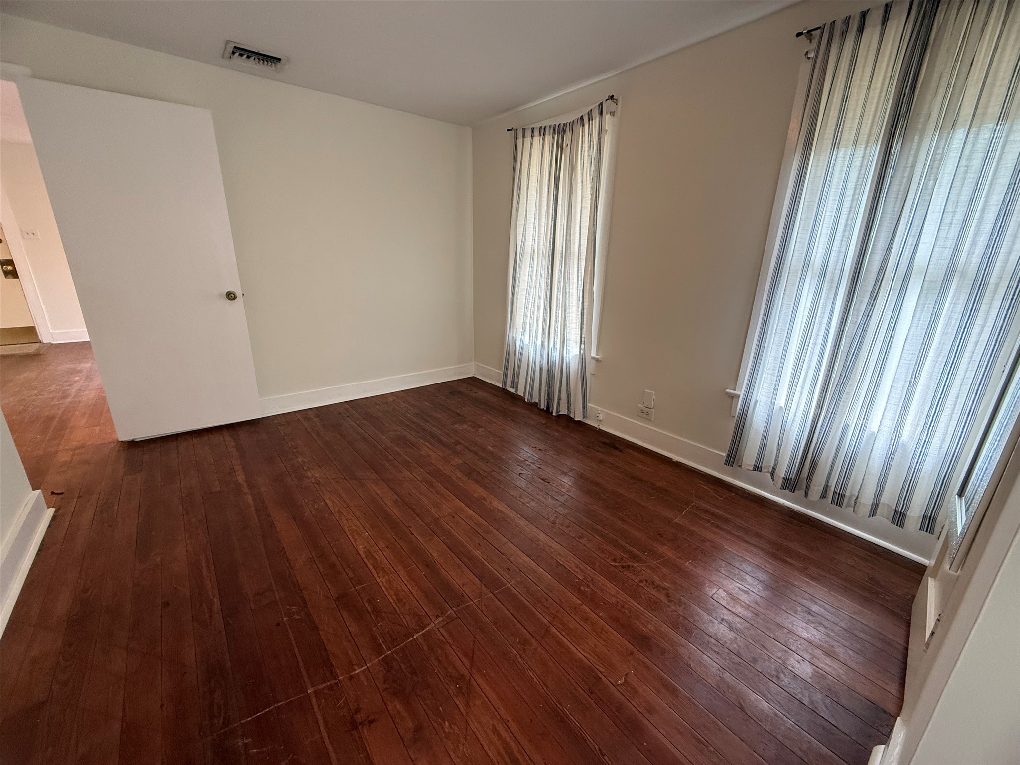 The garage apartment has a separate bedroom space which is large enough for a queen sized bed.