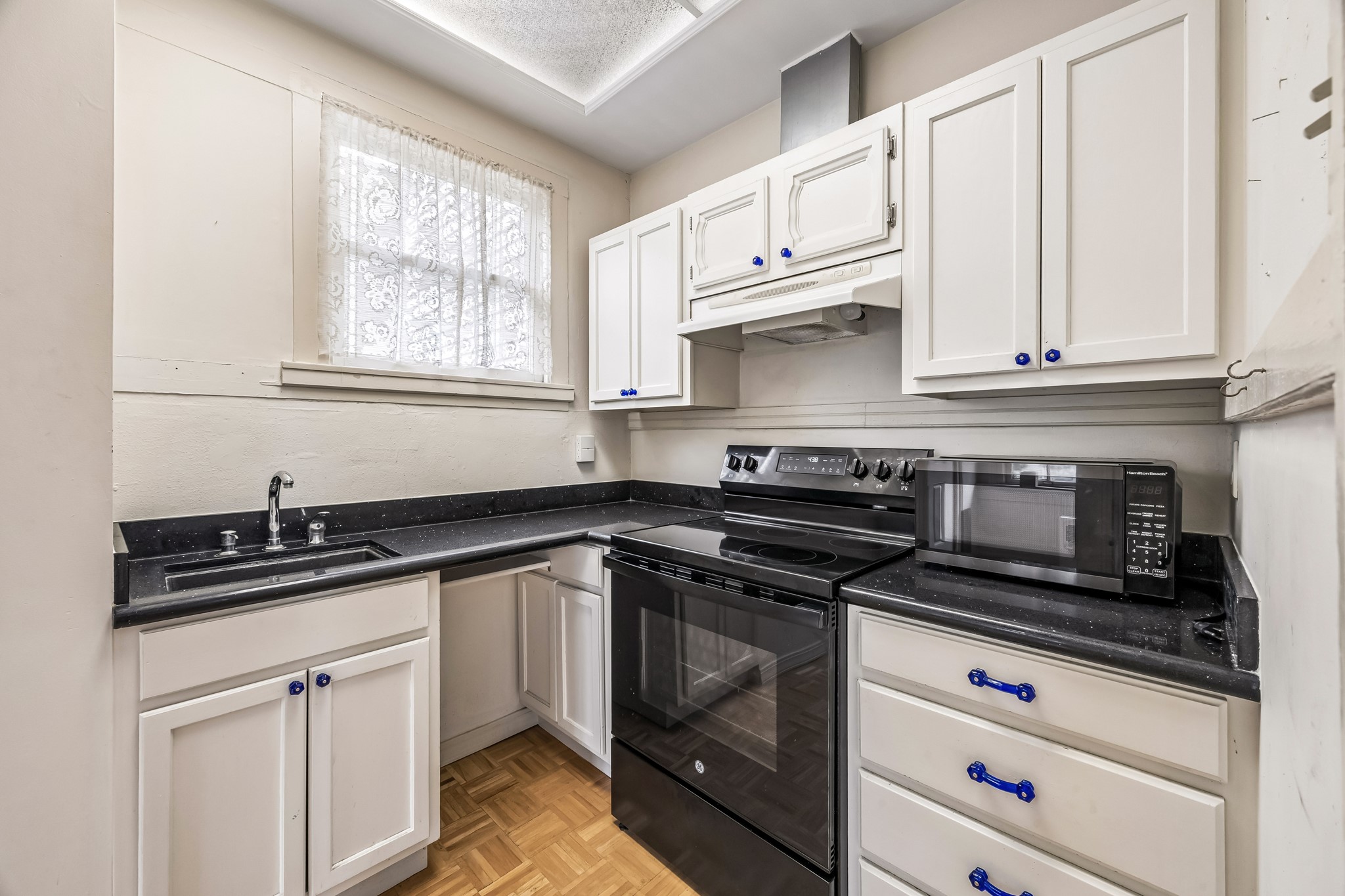 This is where you can cook your gourmet meals after you have prepped everything on the other side of the kitchen. A thoughfully place prep sink and additional counter space adds to the funtionality of this space.