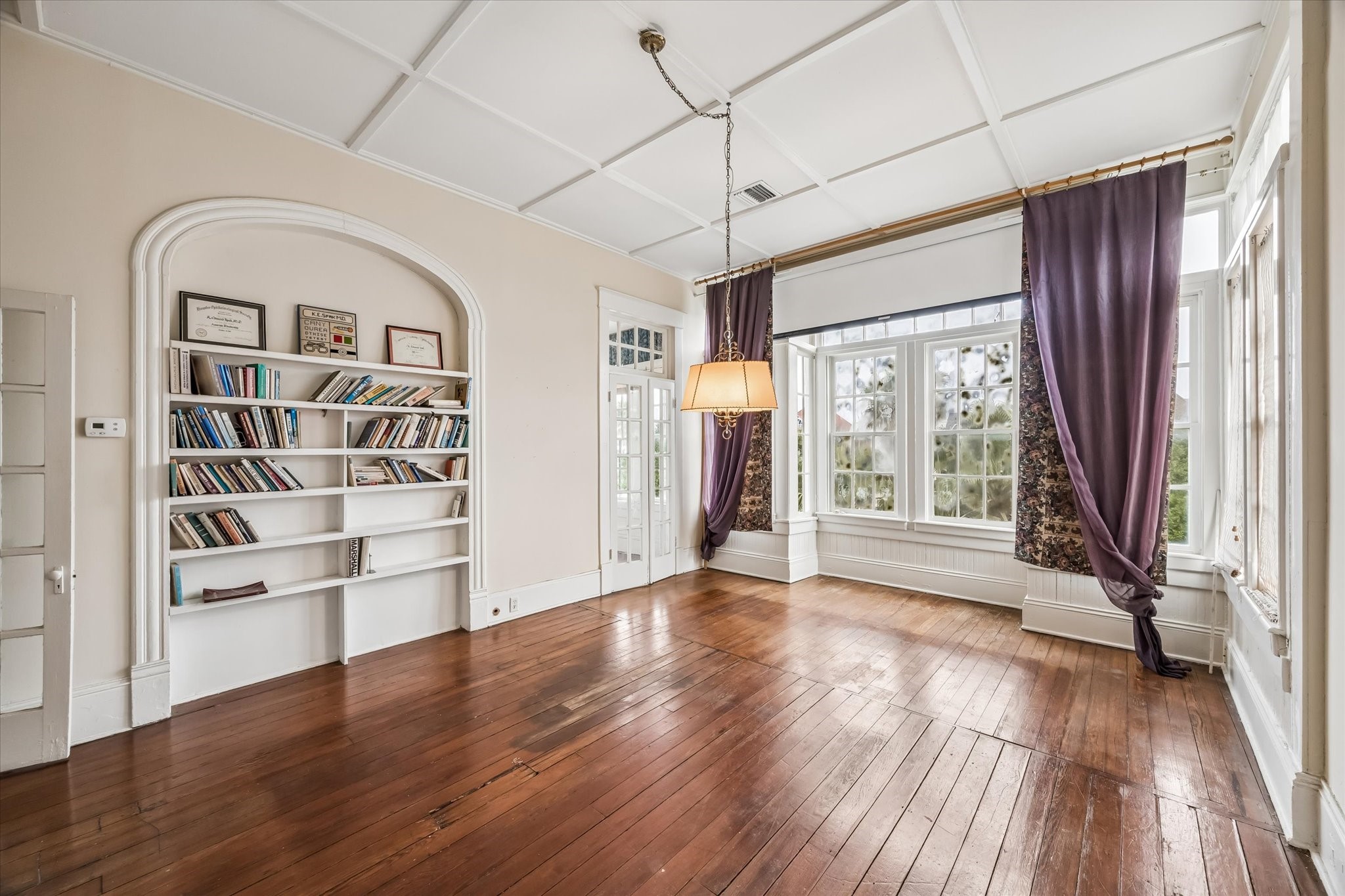 Large game room with a pull down screeen to watch your movies