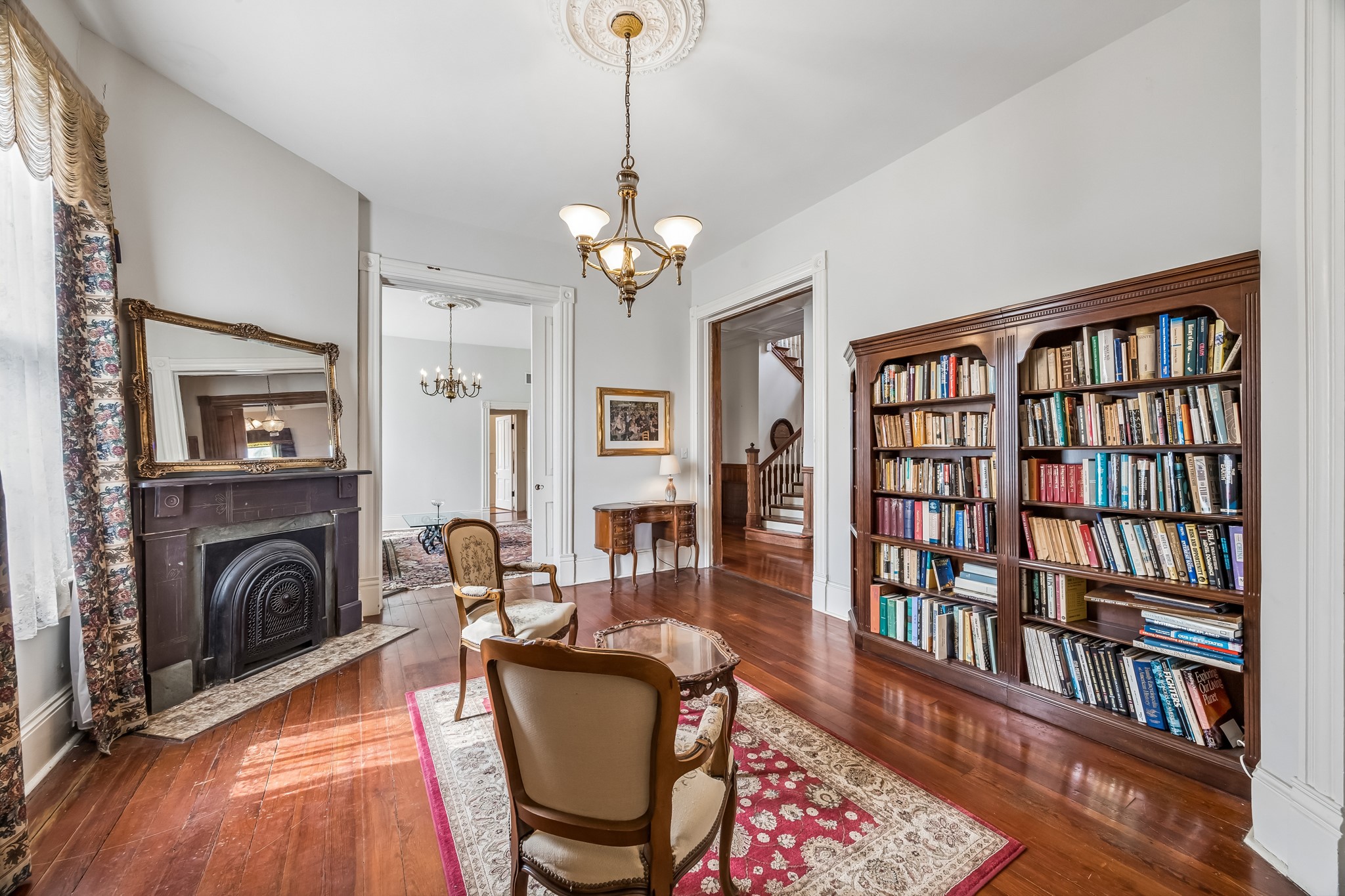 Another view of the library. Both of the doorways contain pocket doors that still work. Another view of the library. Both of the doorways contain pocket doors that still work.