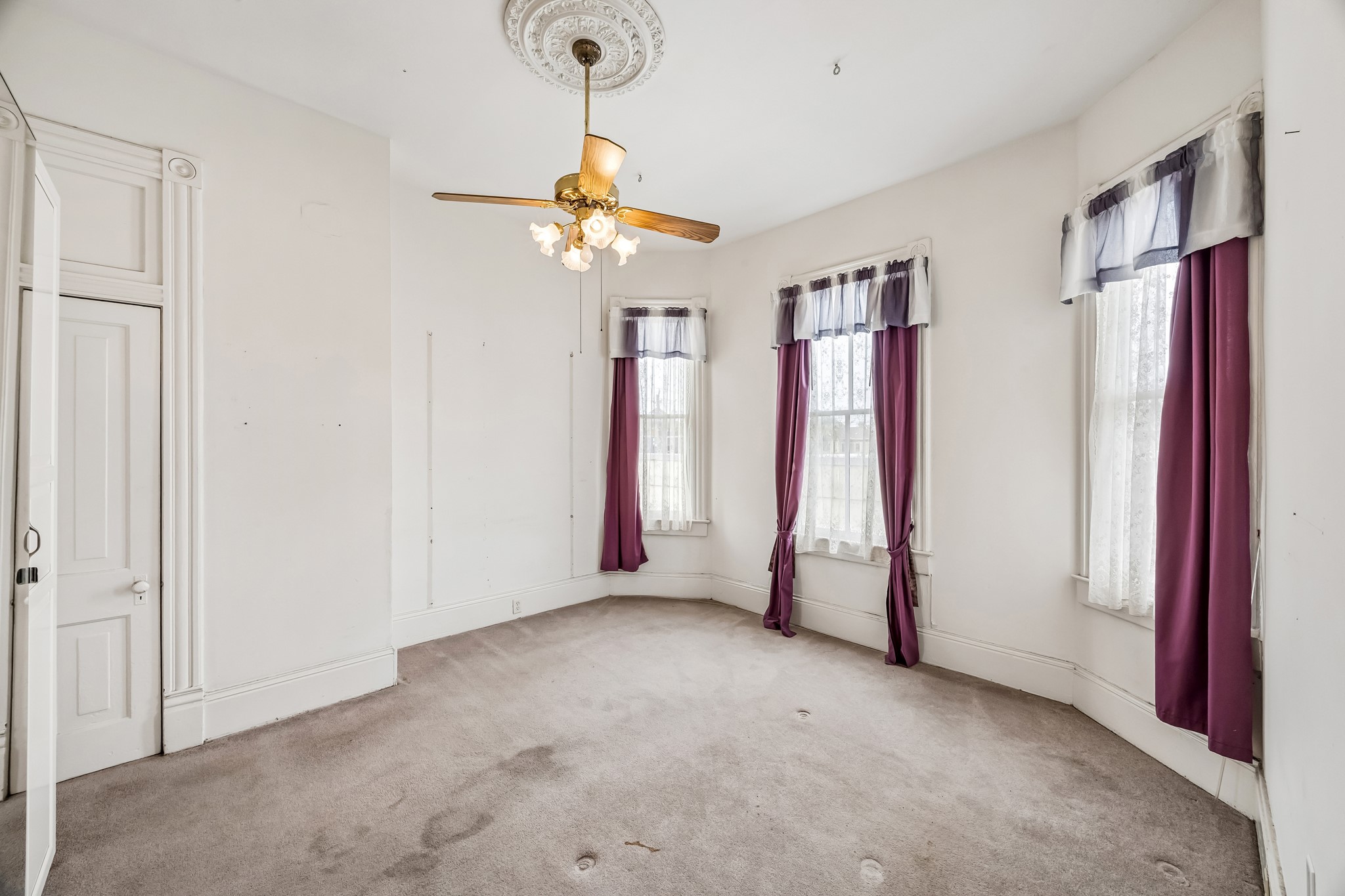 The third of three bedrooms on the third floor.