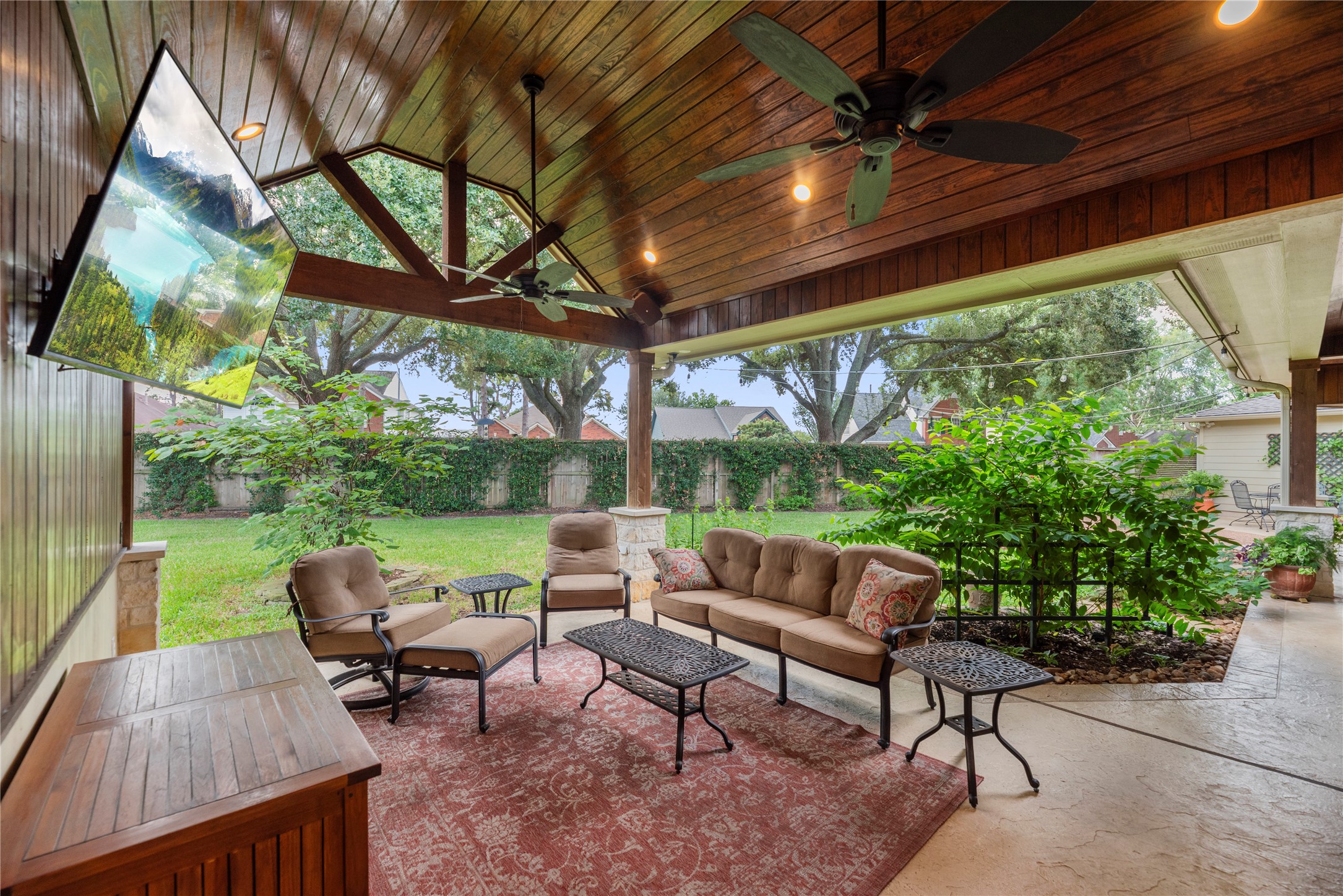 Experience outdoor relaxation in this inviting custom covered patio. Experience outdoor relaxation in this inviting custom covered patio.