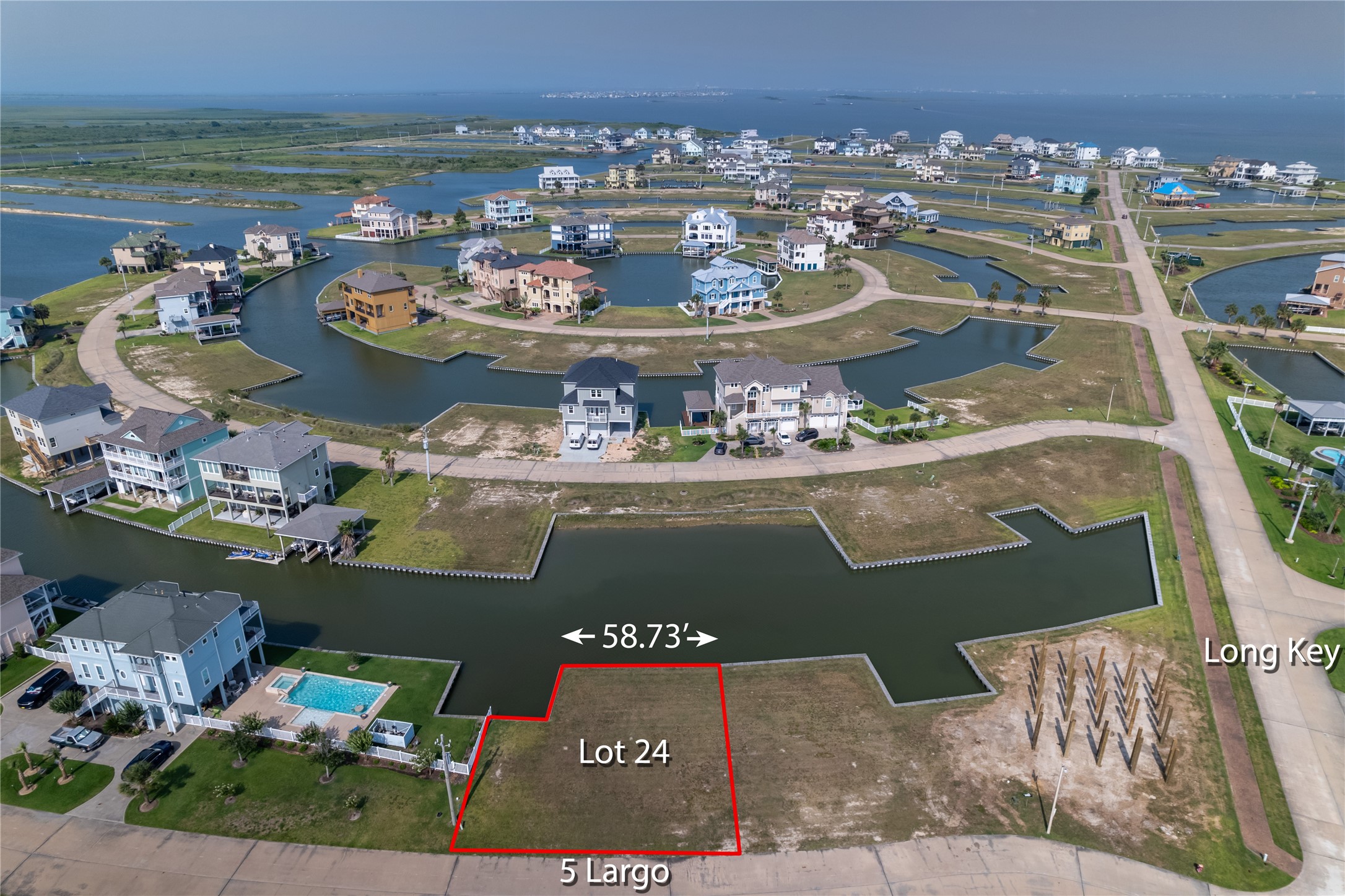 The homesite on the left has a pool so no immediate neighbors & allows for more privacy when you build. There is a reserve across the canal of the homesite giving you more open water views. Boathouse accommodations allow a 30" boathouse. 2200 minimum sq ft to build & bring your own builder. The homesite on the left has a pool so no immediate neighbors & allows for more privacy when you build. There is a reserve across the canal of the homesite giving you more open water views. Boathouse accommodations allow a 30" boathouse. 2200 minimum sq ft to build & bring your own builder.
