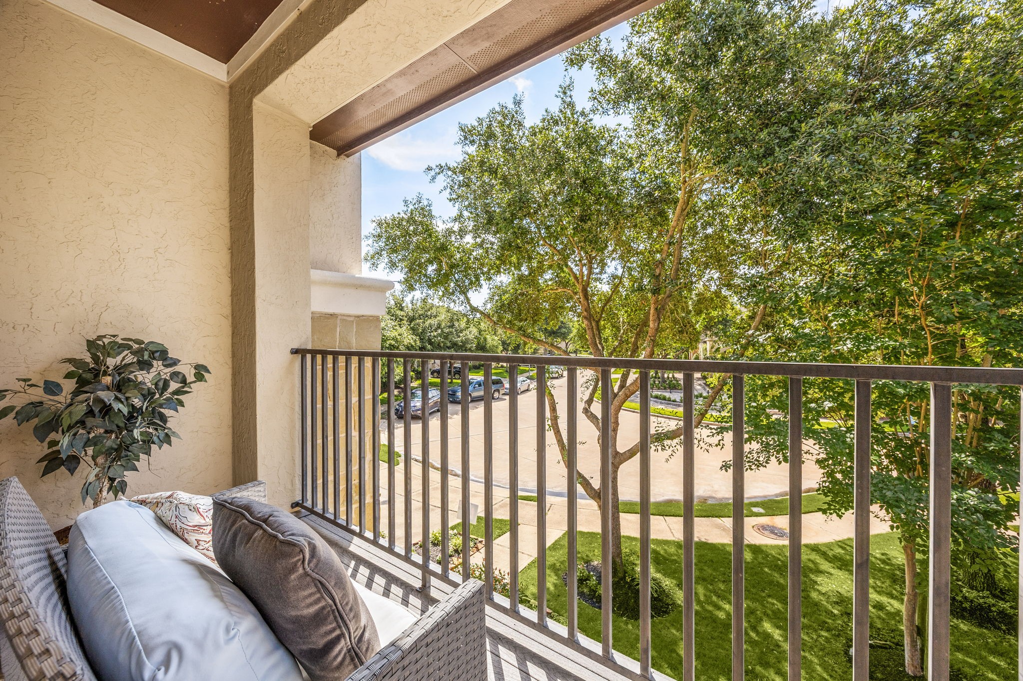 Step outside and breathe it in! This private upstairs balcony offers gorgeous tree-lined views and a peaceful escape right from your bedroom. Pure tranquility!