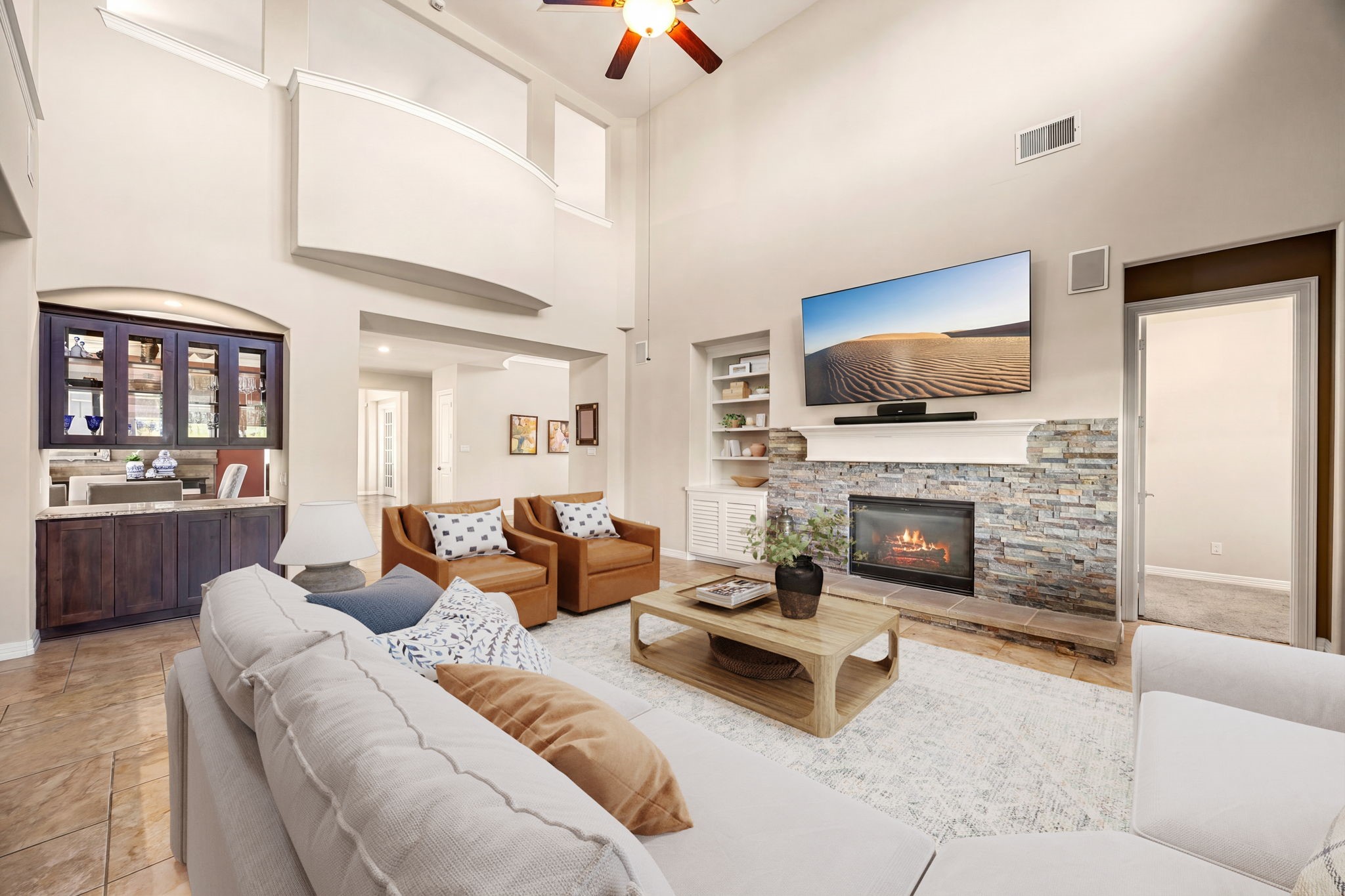 Space, light, and style! Soaring ceilings, walls of windows, and an open-concept layout seamlessly connecting the living room to the kitchen make this the heart of the home. *Virtually Staged Space, light, and style! Soaring ceilings, walls of windows, and an open-concept layout seamlessly connecting the living room to the kitchen make this the heart of the home. *Virtually Staged