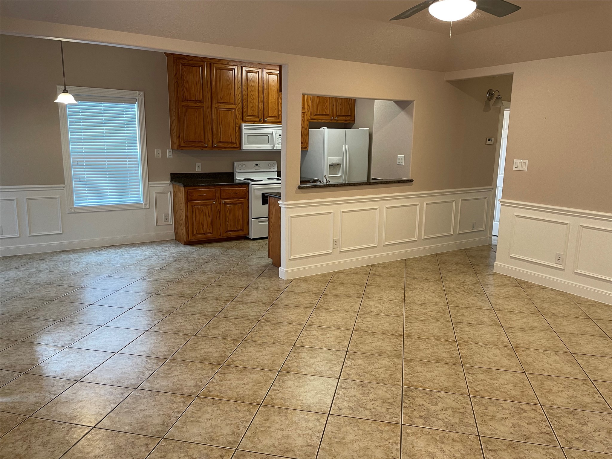 Unit B living, dining and kitchen areas all open
