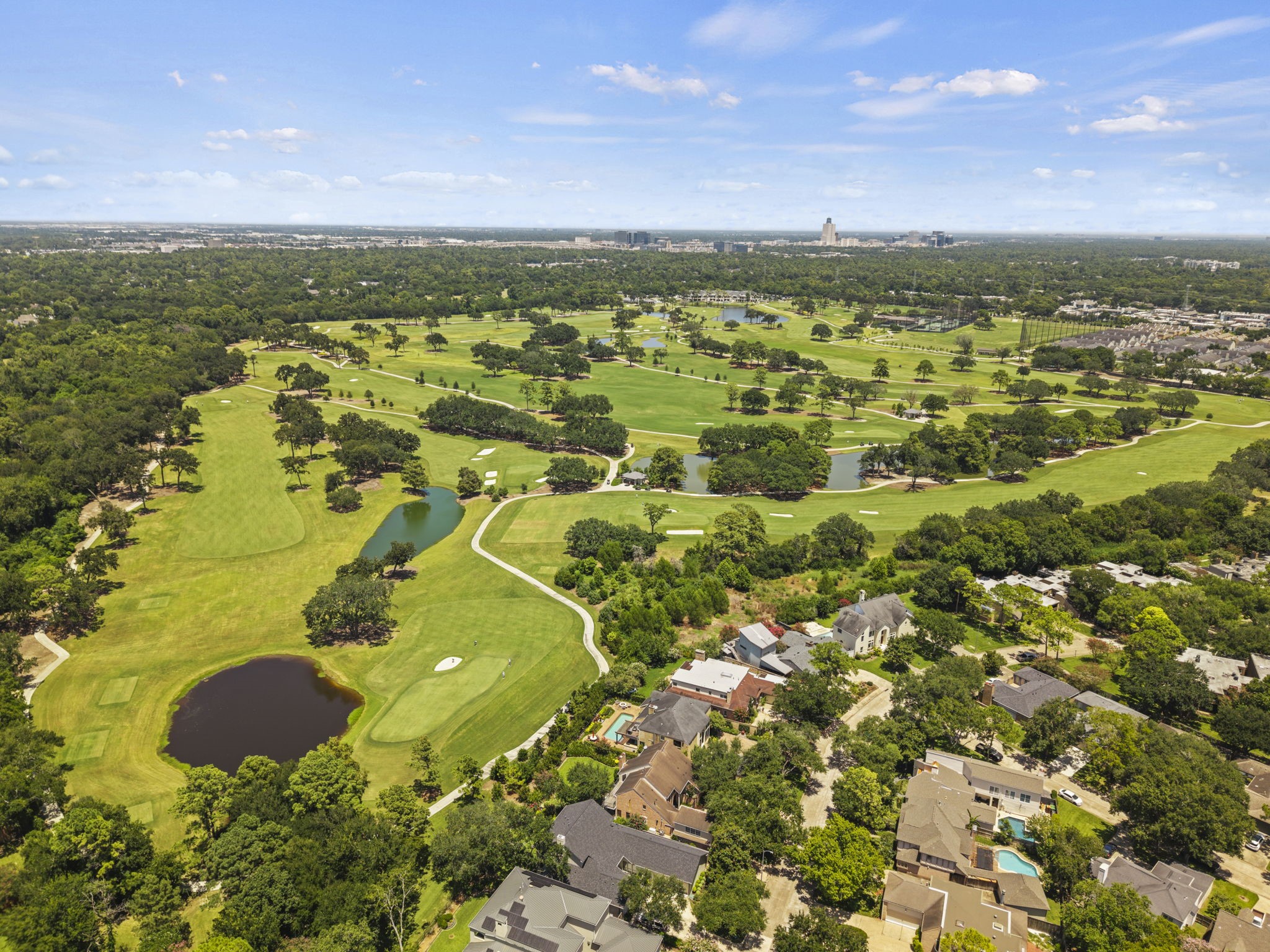 The home is located just steps from Terry Hershey Park and trails, with convenient access to Memorial City, CityCentre, shopping, dining, and major freeway connections. The setting brings together outdoor access and Energy Corridor convenience.