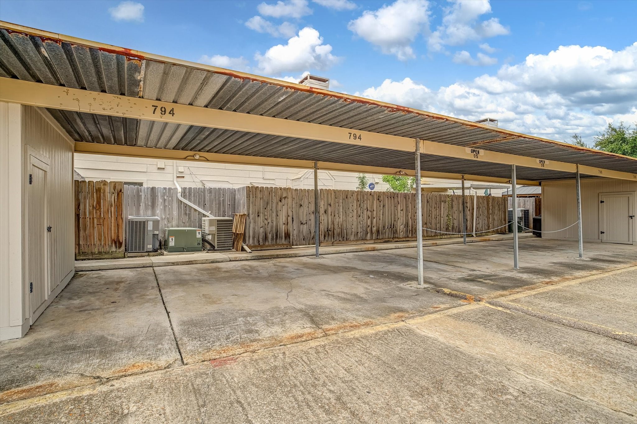 2 dedicated parking spots as well as a storage shed. Direct access from the back of the home.
