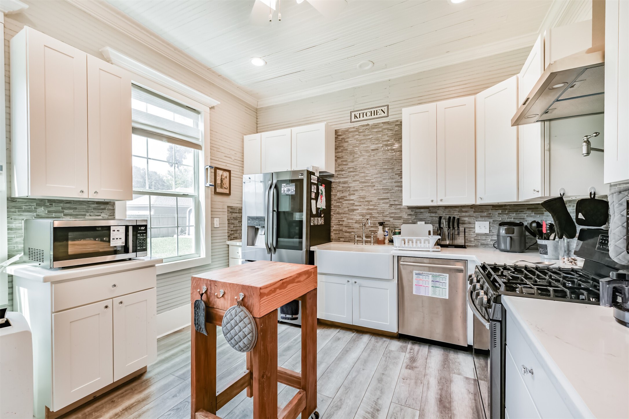Updated kitchen provides modern functionality while complementing the homes historic character.