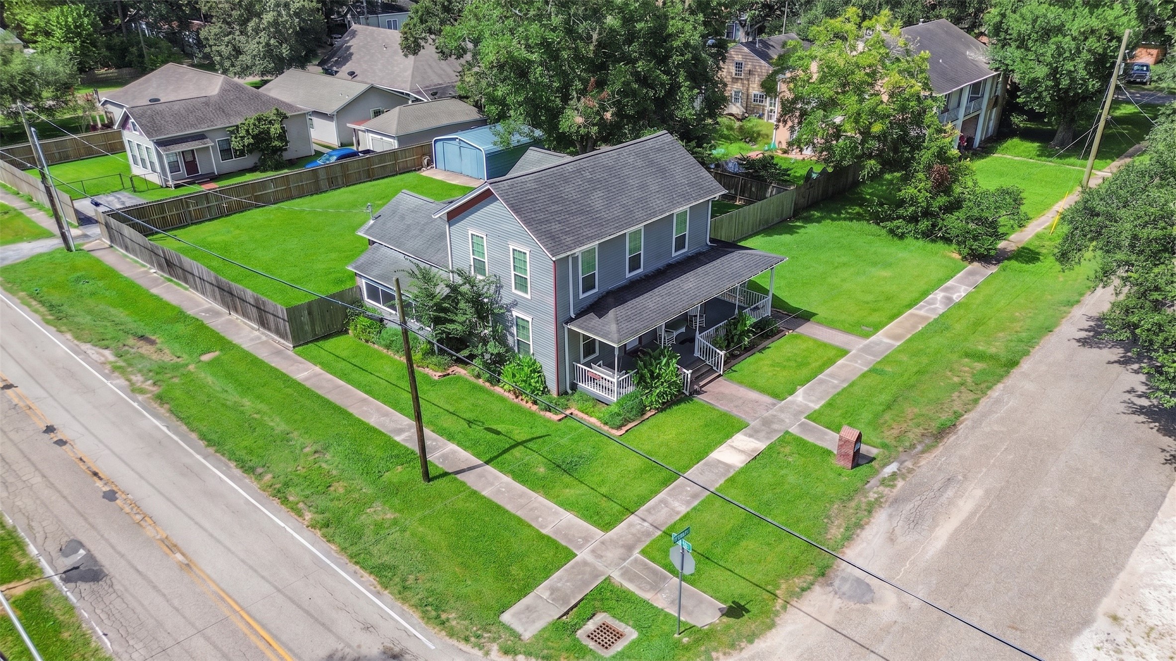 Oversized corner lot offers exceptional visibility, space and flexibility.