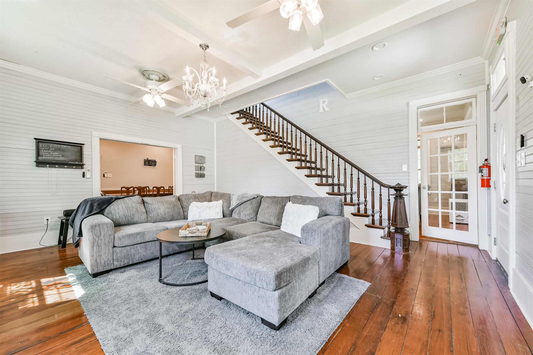 Historic character meets everyday comfort in this generous main living space. Historic character meets everyday comfort in this generous main living space.