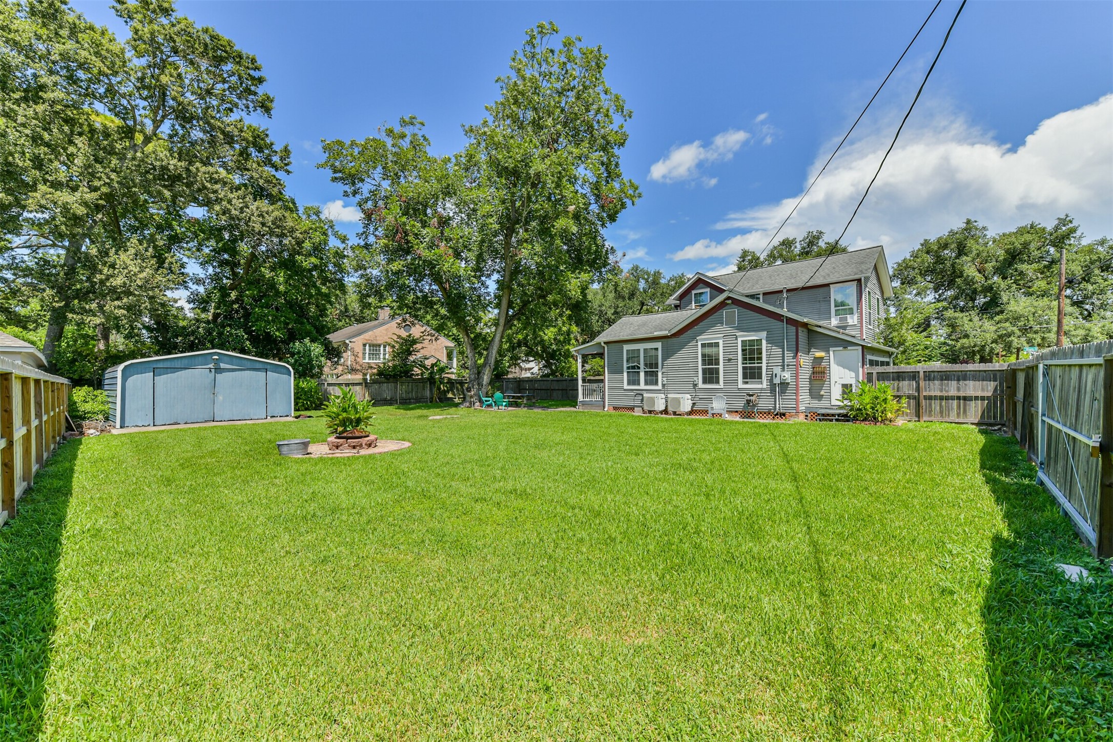 Expansive backyard gives this historic corner property plenty of room to enjoy outdoors.