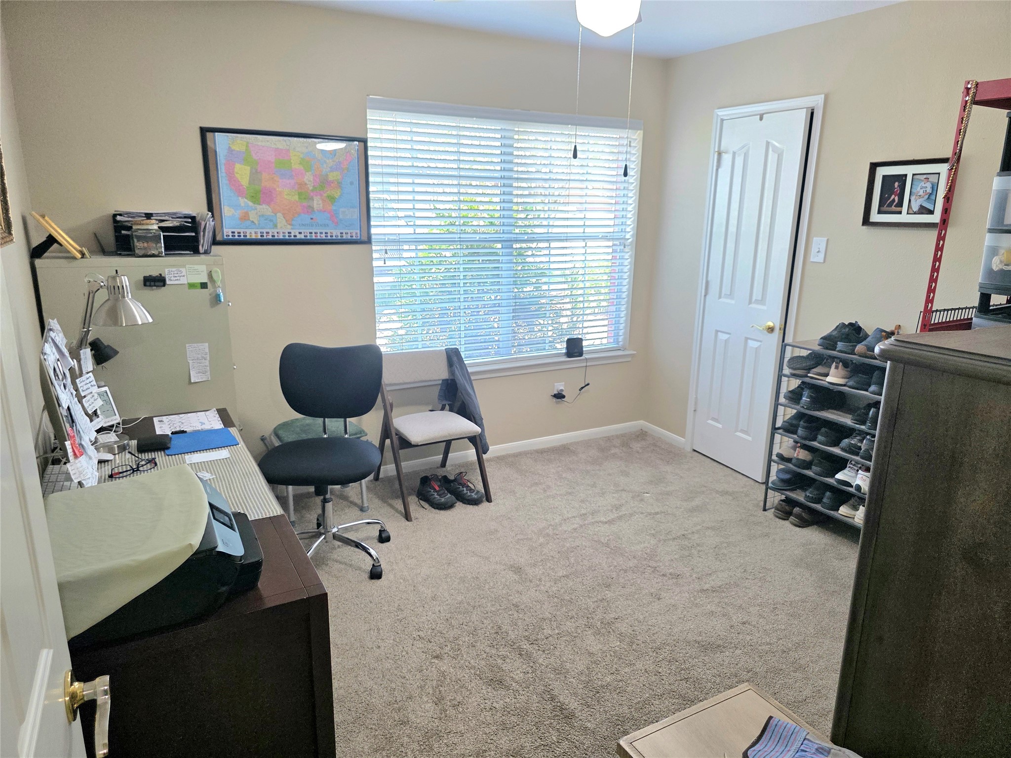 The front guest bedroom is currently being used as an office