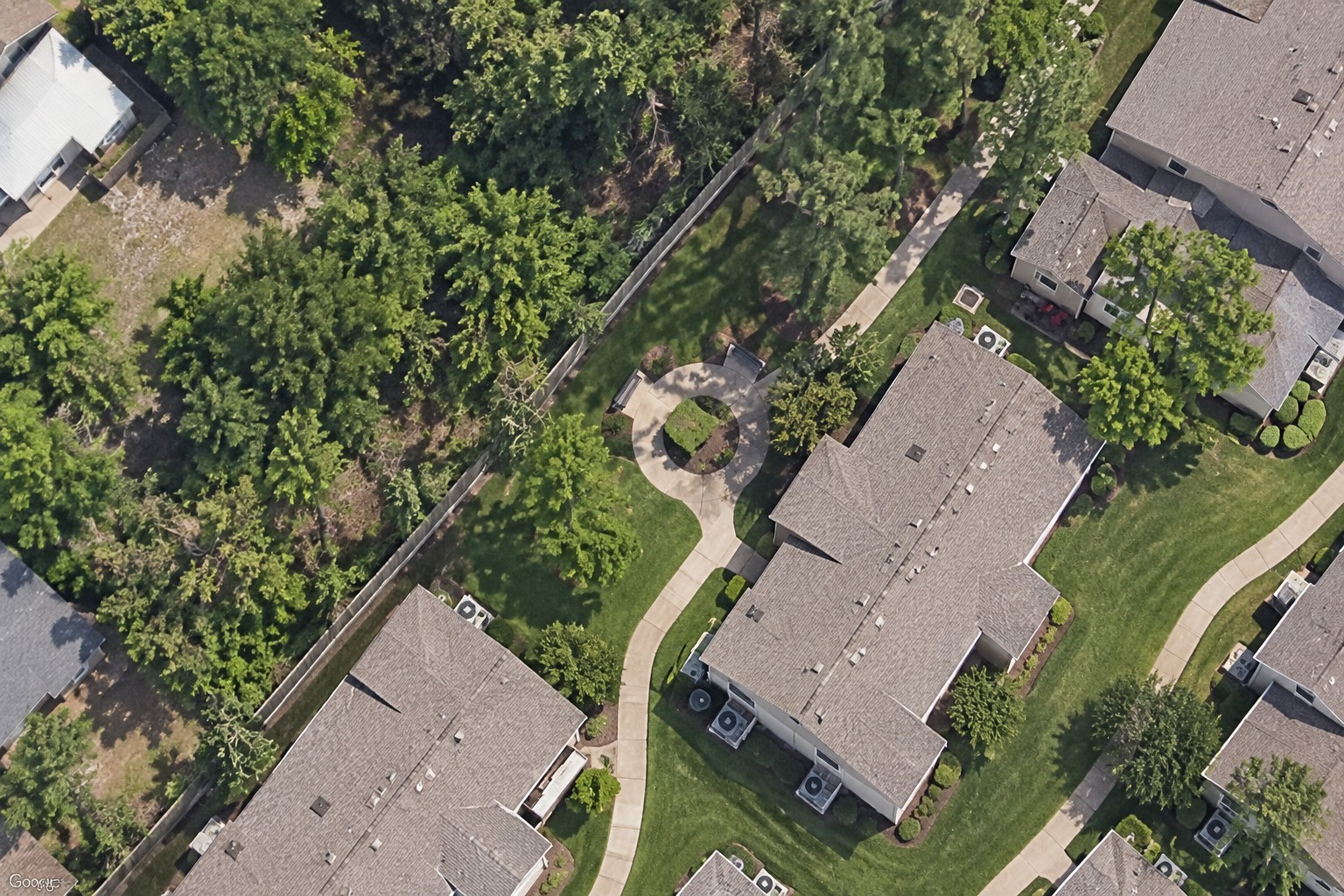 This birds-eye view provides a glimpse of the trails that wind throughout the community. Whether you prefer a leisurely walk with the dog or a brisk jog, this amenity is sure to please your needs.