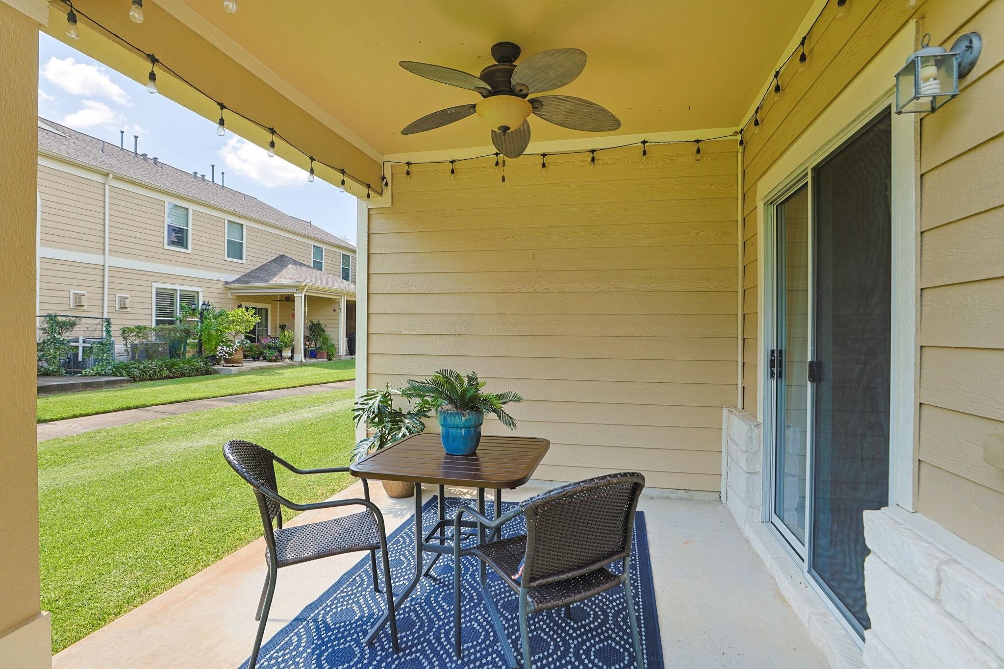 The covered patio is a perfect place to unwind at the end of a busy day. The green belt provides space to stretch-out, with trails that wind throughout the community.