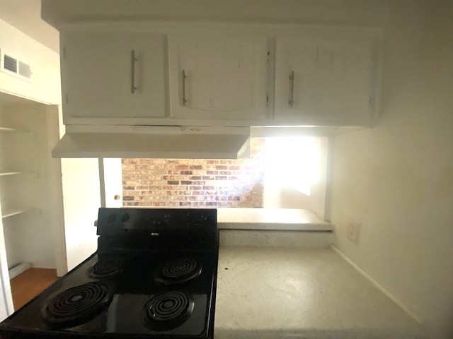 View from kitchen into breakfast nook space.