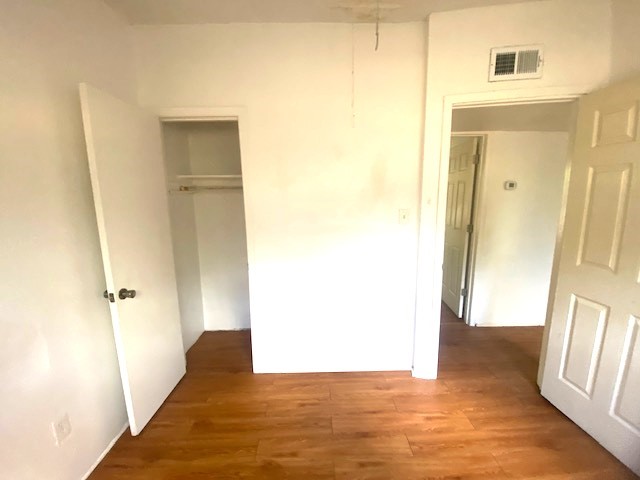 Another view of the secondary bedroom with the full bath right across the hallway.