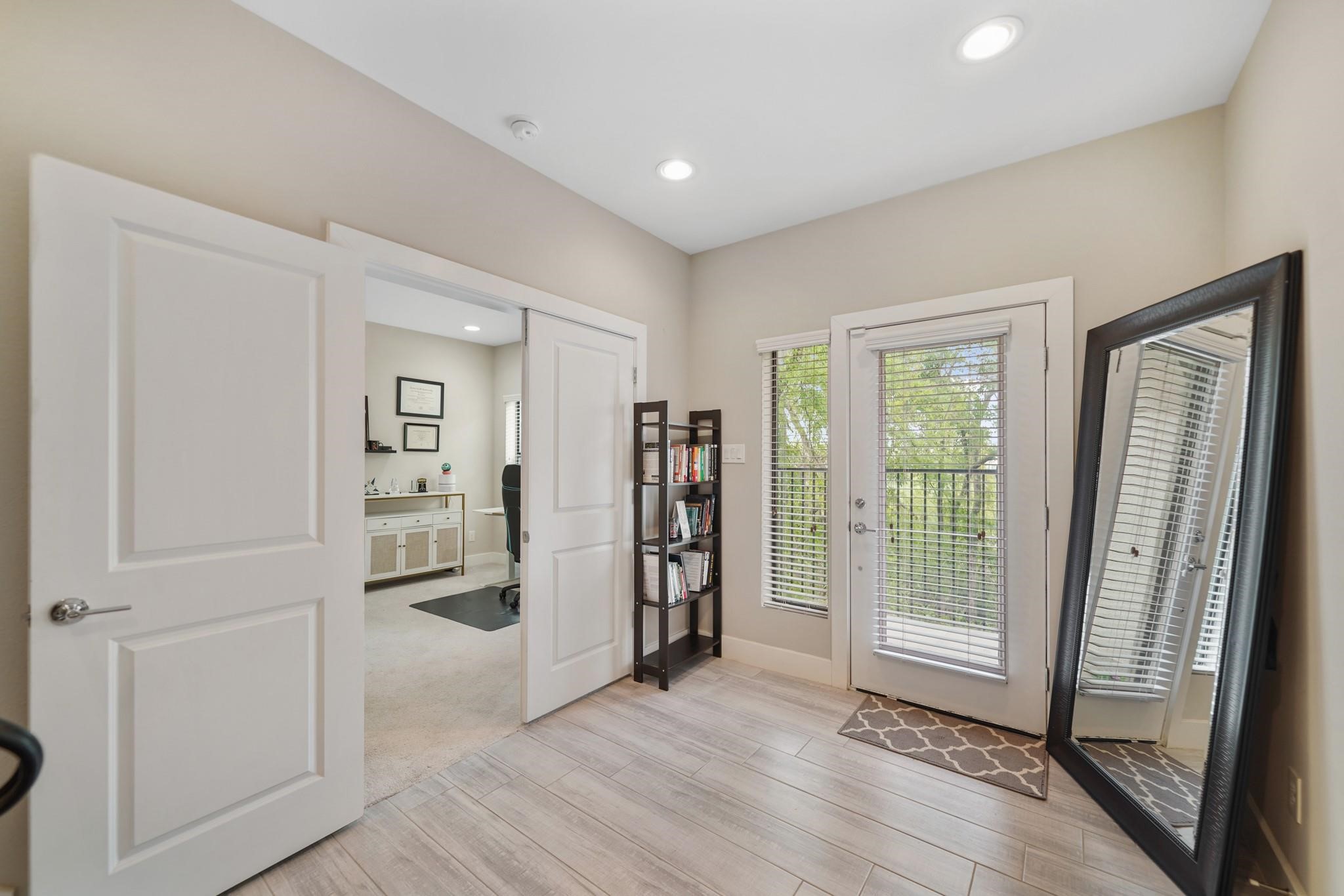 Included is a glass front door with window & blinds. A first floor bedroom with ensuite bath is accessible just through the double door entry on the left. Included is a glass front door with window & blinds. A first floor bedroom with ensuite bath is accessible just through the double door entry on the left.